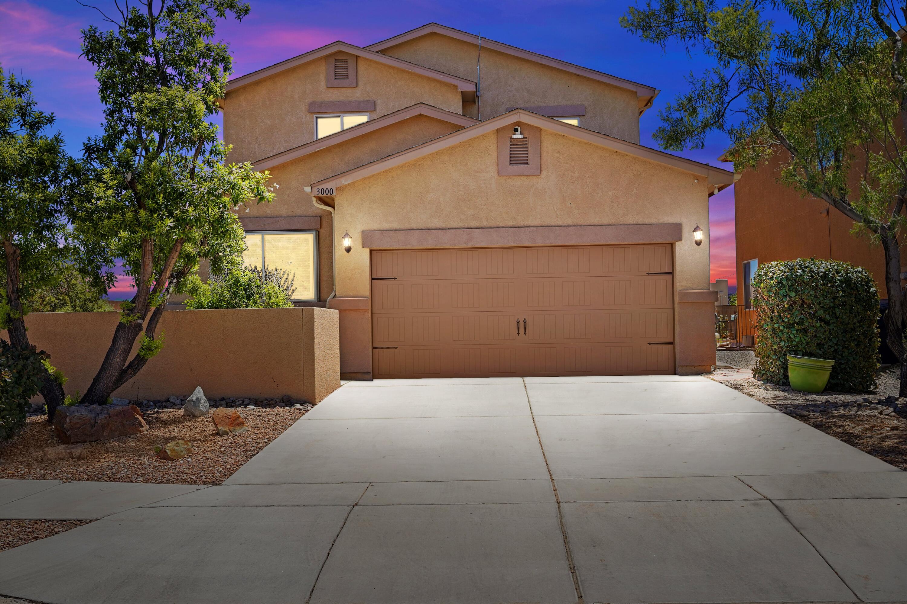 STEP INSIDE THIS LIGHT-FILLED TWO-STORY, 4 BEDROOM, 2.5 BATH HAVEN WITH SOLAR AND FEEL LIFE UNFOLD AROUND YOU. Your day begins in the sun-dappled courtyard, coffee in hand, soft gray walls catching the morning glow as you cross the living room to a quaint kitchen where breakfast sizzles beside the snug dining nook. The secluded downstairs primary suite promises calm nights, its walk-in closet and double-sink bath ready for unhurried routines. Upstairs a spacious family room hosts games and movie marathons while three restful bedrooms wait nearby. Slide open the patio door to an immense walled yard of carefree gravel, an open canvas for starlit gatherings and weekend play. Parks a short stroll away extend the adventure. Schedule your private tour today.