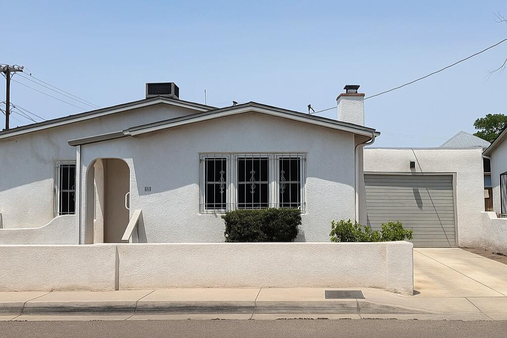Charming 2 bed, 1 bath bungalow in Albuquerque's vibrant Old Town Historic District! Zoned residential and commercial, this well-maintained home blends historic charm with modern comforts. Features include hardwood floors, refrigerated air, security bars, laundry hookups, 1 car garage, and an easy maintenance, private fenced yard. Steps from Old Town Plaza and Shopping Center, NM Museum of Natural History, Explora, Abq Aquarium, and Rattlesnake Museum. Walk score 89, near public transit, University of New Mexico (about 3 miles), top hospitals (Lovelace, Presbyterian about 2 miles), and easy access to Downtown, Sawmill District, galleries, restaurants, shopping all in a premier location with timeless appeal!  Whether you need a home, business, or both, this one's for you.