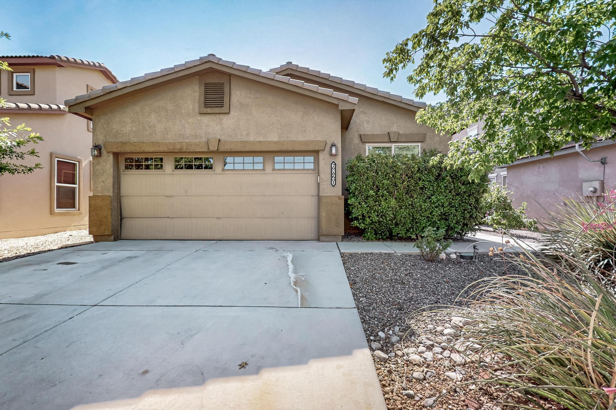 Welcome to this charming freshly painted 4 bed, 2 bath home in the sought-after Montecito neighborhood! Perched at the top of the scenic Petroglyphs, this gem offers an open floor plan, modern kitchen, and cozy living spaces perfect for relaxing or entertaining. The spacious backyard is ready for summer BBQs or quiet mornings with coffee. With its prime location near trails, parks, and shopping, this home blends convenience with New Mexico charm. Don't miss your chance--come see it today and make it yours!