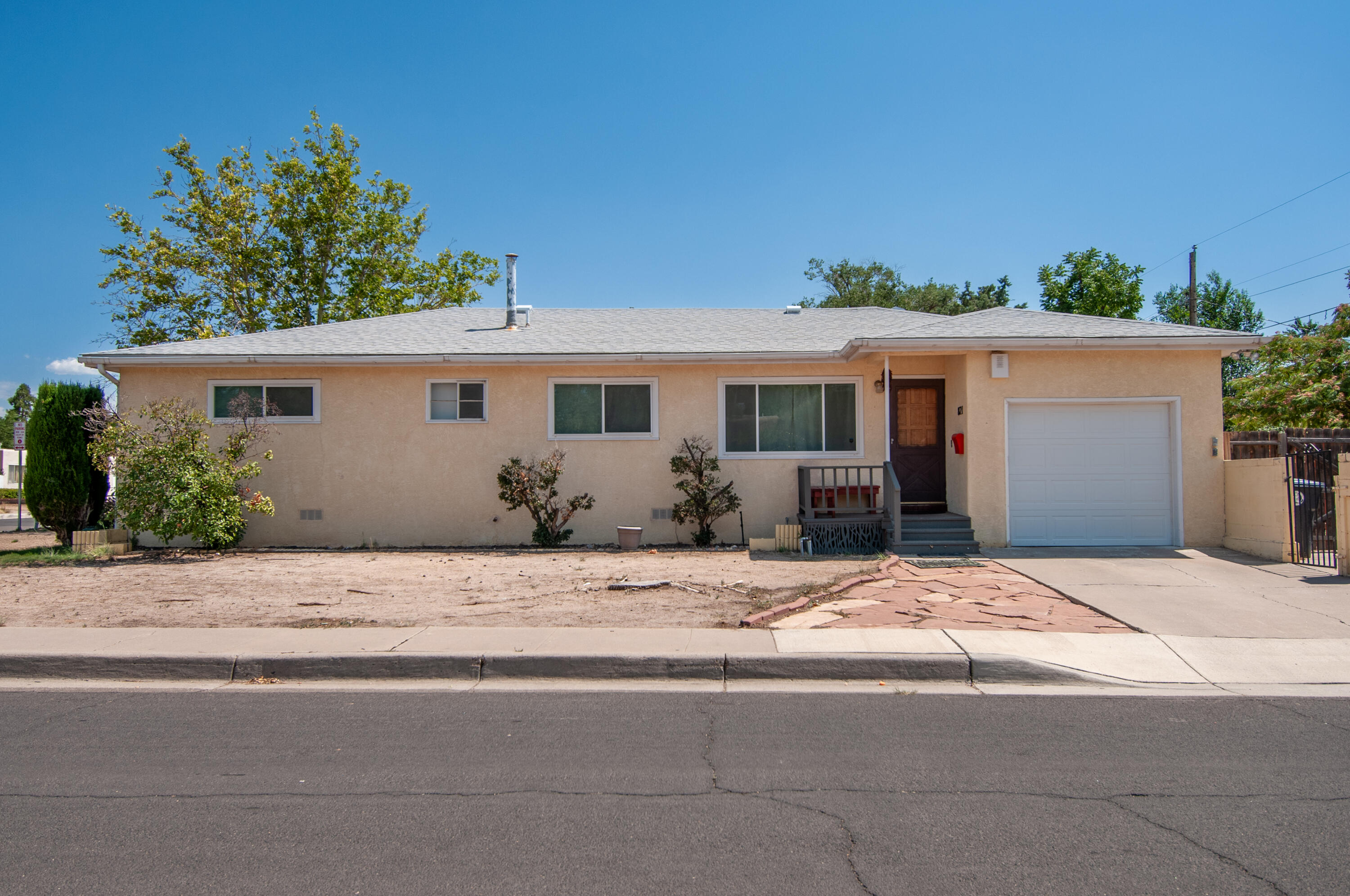 ** OPEN TODAY  1-2:30 ** Charming home in the Fox Park area, close to the State Fair. Genuine hardwood floors add warmth throughout. The generous living room flows into a dining space. The kitchen stands out with a playful floor design and stainless steel appliances. Down the hall are three comfortable bedrooms, with the primary offering its own 3/4 bath for added privacy. A versatile laundry room includes a built-in workbench or desk--perfect for projects or organization. Attached one-car garage adds convenience. The side yard offers potential for a 'backyard retreat'. A spacious storage shed provides plenty of room for extras. Enjoy comfort from the heat with refrigerated air.