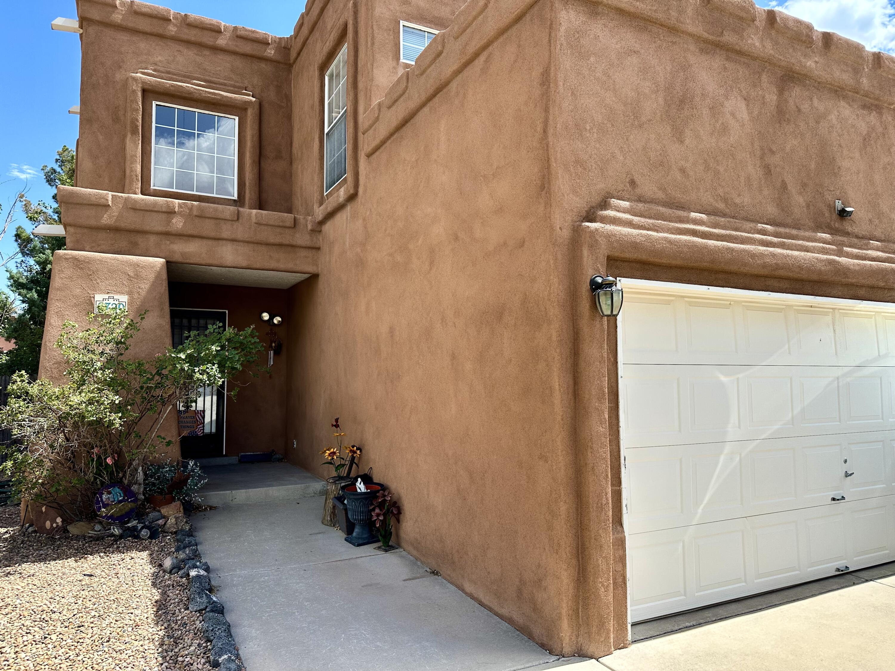 Nestled in a quiet, tucked-away corner of Taylor&#8239;Ranch, this beautifully maintained 3&#8209;bedroom, 3&#8209;bath home offers an open kitchen with pantry that flows effortlessly into the living area--perfect for entertaining or everyday living. A spacious two-car garage and a fully landscaped backyard create an ideal balance of practicality and outdoor enjoyment. Just steps away, you'll find Santa Fe Village Park with playgrounds, sports fields, picnic spots, a dog park, and the nearby Santa Fe Village/Santo Domingo Trailheads--offering paved walking and biking trails right in your neighborhood. This home blends peaceful privacy with easy access to community amenities, making it the perfect place to live.