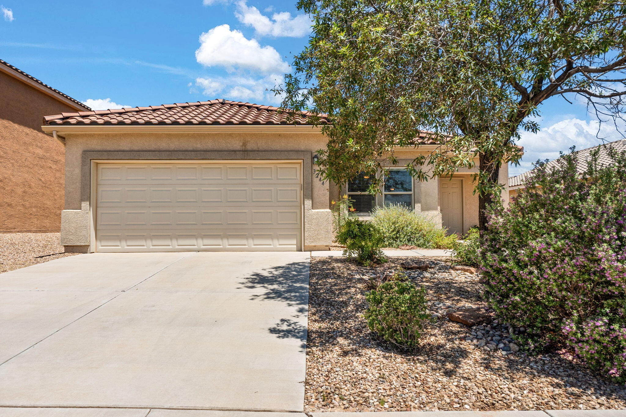 This lovely listing is located in the newer Huning Ranch Community. It has great curb appeal and a functional floor plan. The living room is oversized. The island kitchen includes all of the appliances. The primary suit features a bright bathroom and a large walk-in closet. The other two bedrooms are very comfortable in size. The office / den area could easily be converted into a fourth bedroom. The laundry room, which includes the washer and dryer, also has extra storage space. The garage, which is finished, has numerous built-in shelves. Landscaping is very low maintenance and the backyard backs up to ''open space'' for additional privacy. This listing has been owner-occupied since construction. Pride of ownership is totally on display. This property is absolutely move-in ready.