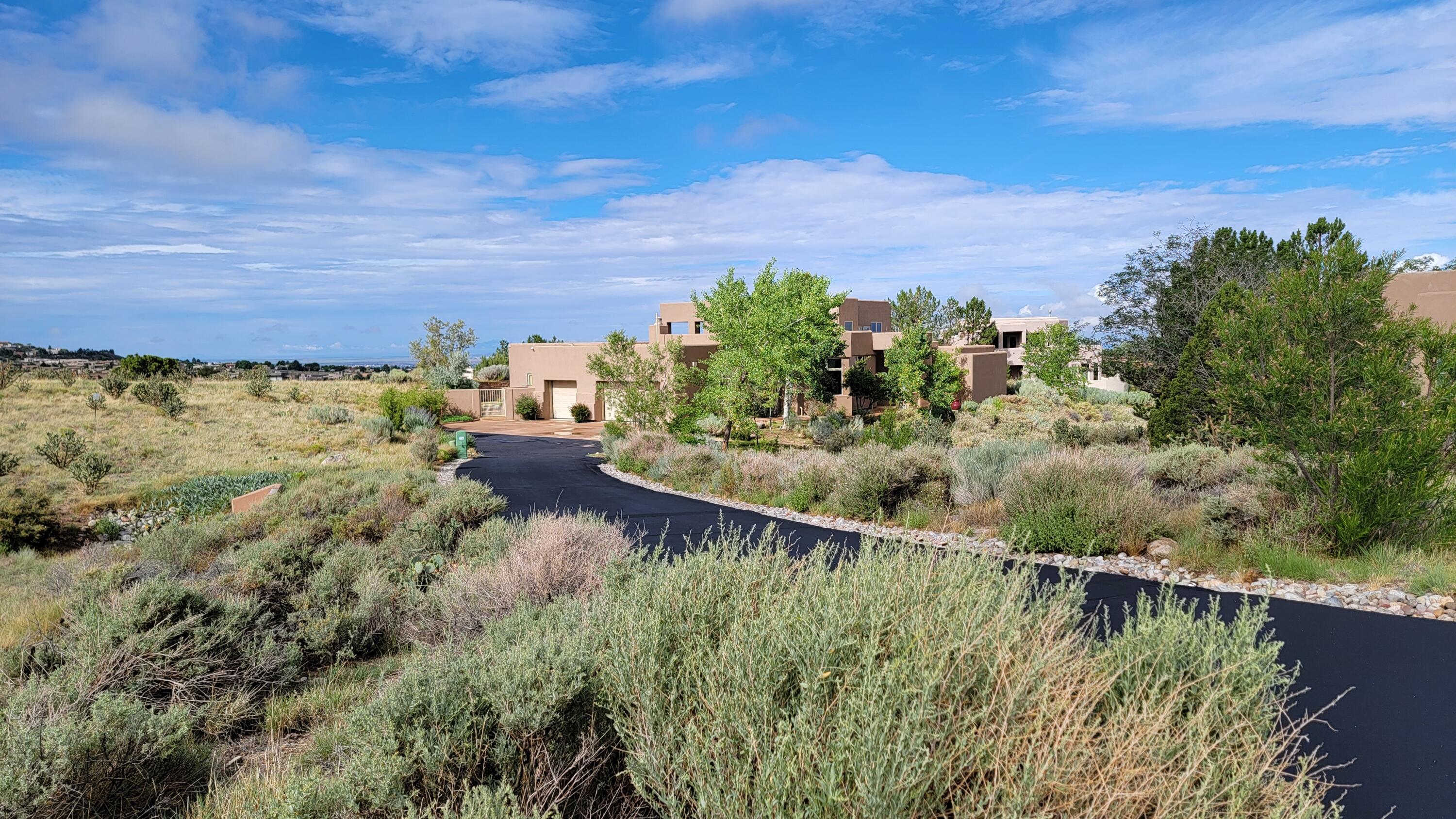 Perfect blend of smart innovation & timeless elegance in High Desert. Situated on approx. 1.08acres of naturally landscaped terrain. Inside, you'll find two luxurious primary suites--one upstairs, one down--each w/spa-inspired baths. Media room w/wet bar & control room creates the ultimate environment for entertainment. Two spacious living areas, three fireplaces (two gas, one wood), this home adapts to every season & occasion. Radiant heating, plaster walls, built-in speaker system, TPO roof, & owned solar. Smart features for lighting, garage doors, & security system. Jack & Jill bath connects the 3rd/4th bedrooms for added comfort. Bonus room off the garage is rough-plumbed for future retreat area. 220V access for hot tubs & serene views. These opportunities are increasingly rare. ACT NOW