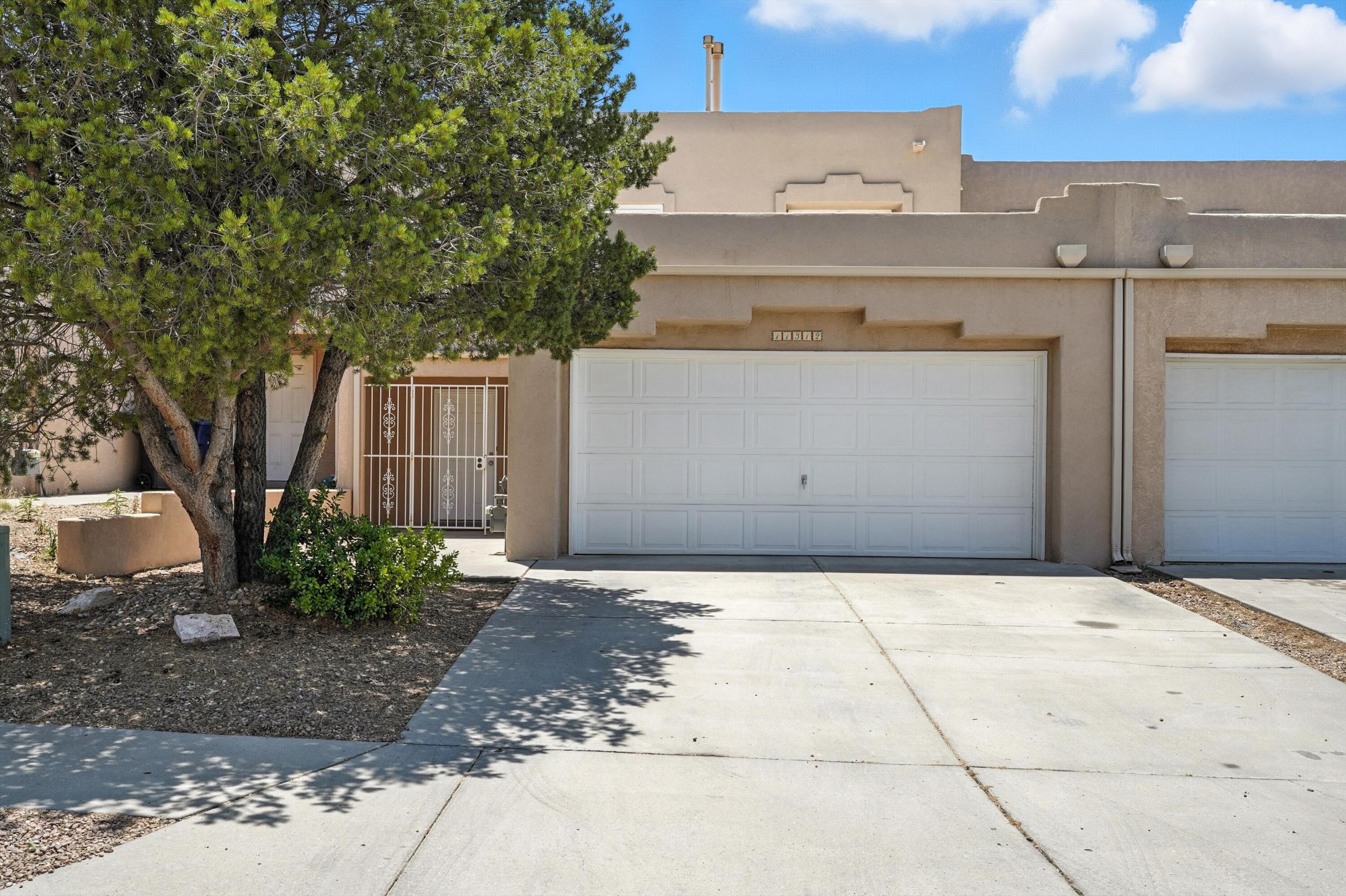 CAPTIVATE YOUR SENSES THE MOMENT YOU STEP INTO THIS LIGHT-FILLED TWO-STORY RETREAT AT 11312 CAMPO DEL OSO, WHERE DESERT SUN STREAMS THROUGH SKYLIGHTS AND A FIREPLACE BECKONS STORY-FILLED EVENINGS. Flow from the airy living room to a kitchen bar perfect for sunrise coffee, then out to a covered patio and cozy walled yard that frames the Sandia foothills sky. The 1800+ sf layout grants three restful bedrooms; the primary pampers with a walk-in closet and views. Minutes to I-40, Embudito hiking, Four Hills golf, Kirtland and Uptown dining, you'll savor foothills tranquility with city ease. CLAIM THIS HAVEN TODAY AND BEGIN YOUR NEXT CHAPTER!