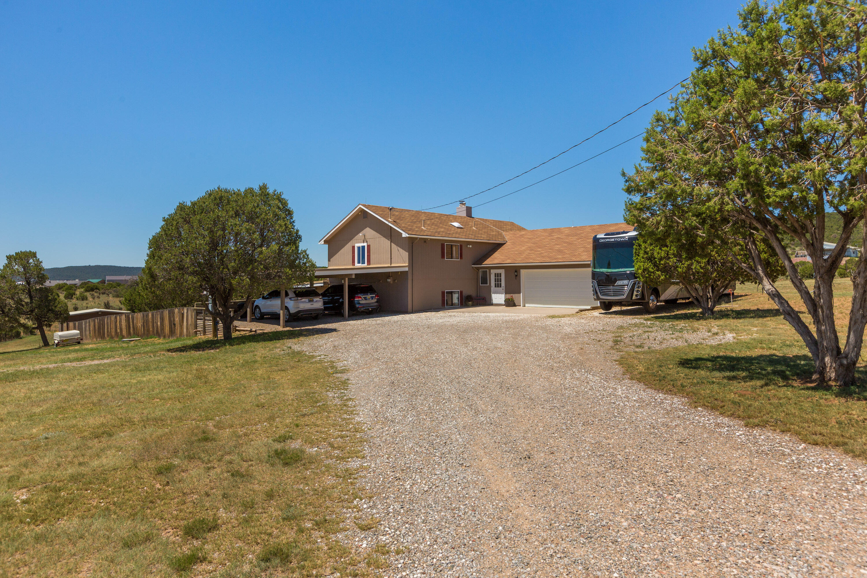 Custom Split-Level Home on 3 Acres - Energy Efficient, Packed with Features & Multiple Recent Upgrades.Discover the perfect blend of comfort, functionality, and style in this one-owner, immaculately maintained split-level custom home, situated on 3 private acres. With insulated concrete form design and a centrally located woodstove, energy efficiency is built right in - enjoy remarkably low utility bills all year long!Step inside to find handcrafted custom cabinetry throughout, a well-appointed kitchen with stainless steel appliances, a breakfast bar, and an incredible walk-in storage pantry you'll absolutely love.The sunroom stretches across the entire first floor, offering abundant natural light and stunning views, with a dining room at one end - a perfect spot to end your day