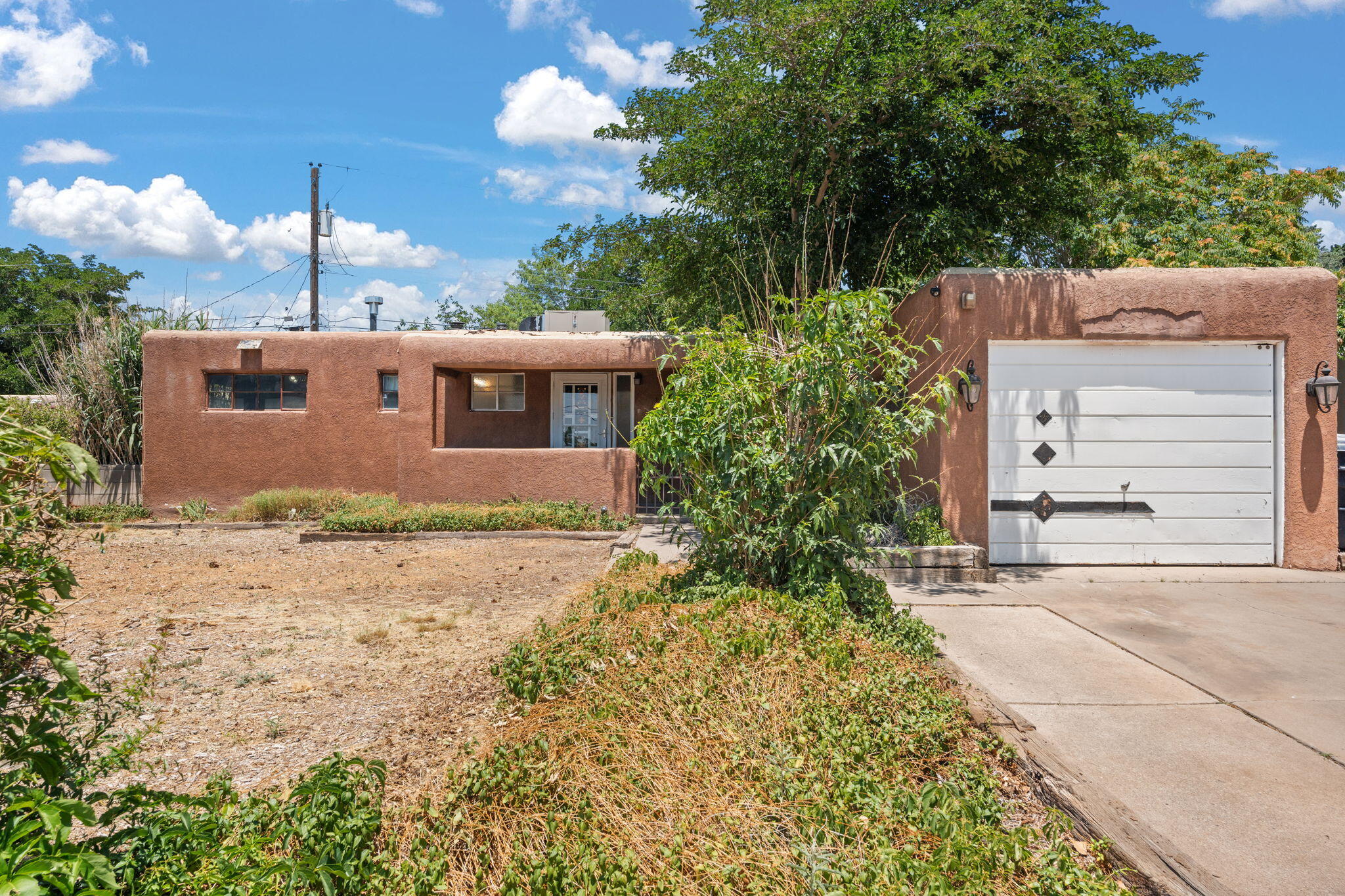 Investor special! Cash-only, as-is sale priced well below market. All utilities on. 2 bed/2 bath upstairs + full 1,200+ sq ft basement with 4 more bedrooms and an unfinished bath. Updated to 200 amp electrical. Single-car attached garage. Needs full renovation--huge upside in a solid neighborhood. Bring your vision and unlock the potential!