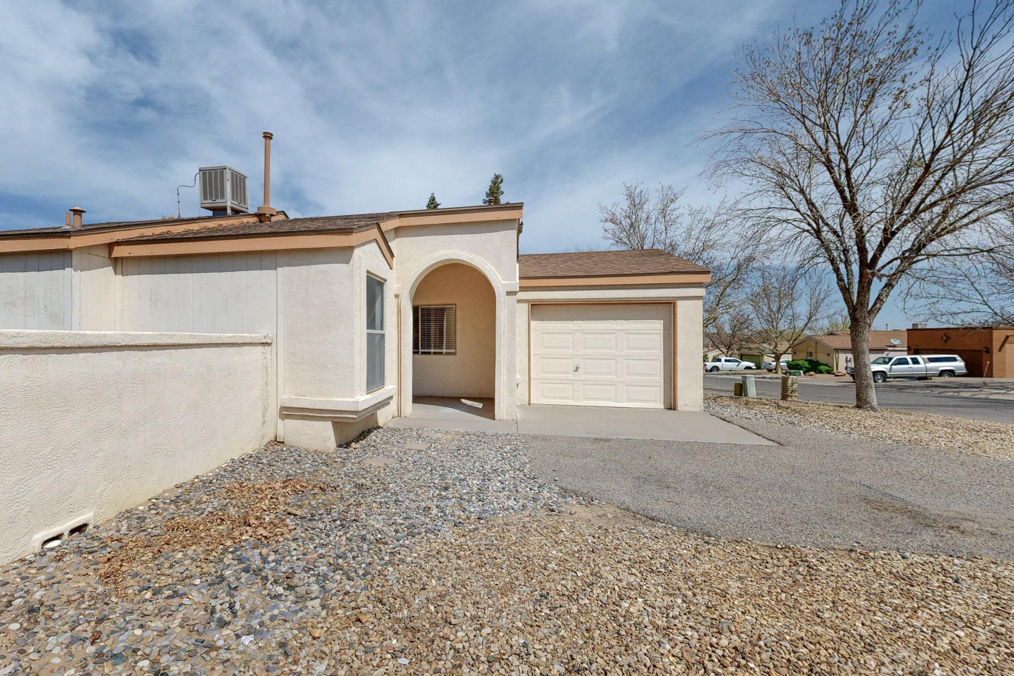 Back on the market with new flooring. Nestled in an established Rio Rancho Community, this home is a fantastic opportunity for any buyers to make the leap into home ownership. The home has been tastefully updated and lovingly taken care of to the point where the only thing missing is your own furniture. This home is a move-in-ready gem at this price point and offers a comfortable floorplan, and opportunities to get creative and express your own style in the spacious backyard.