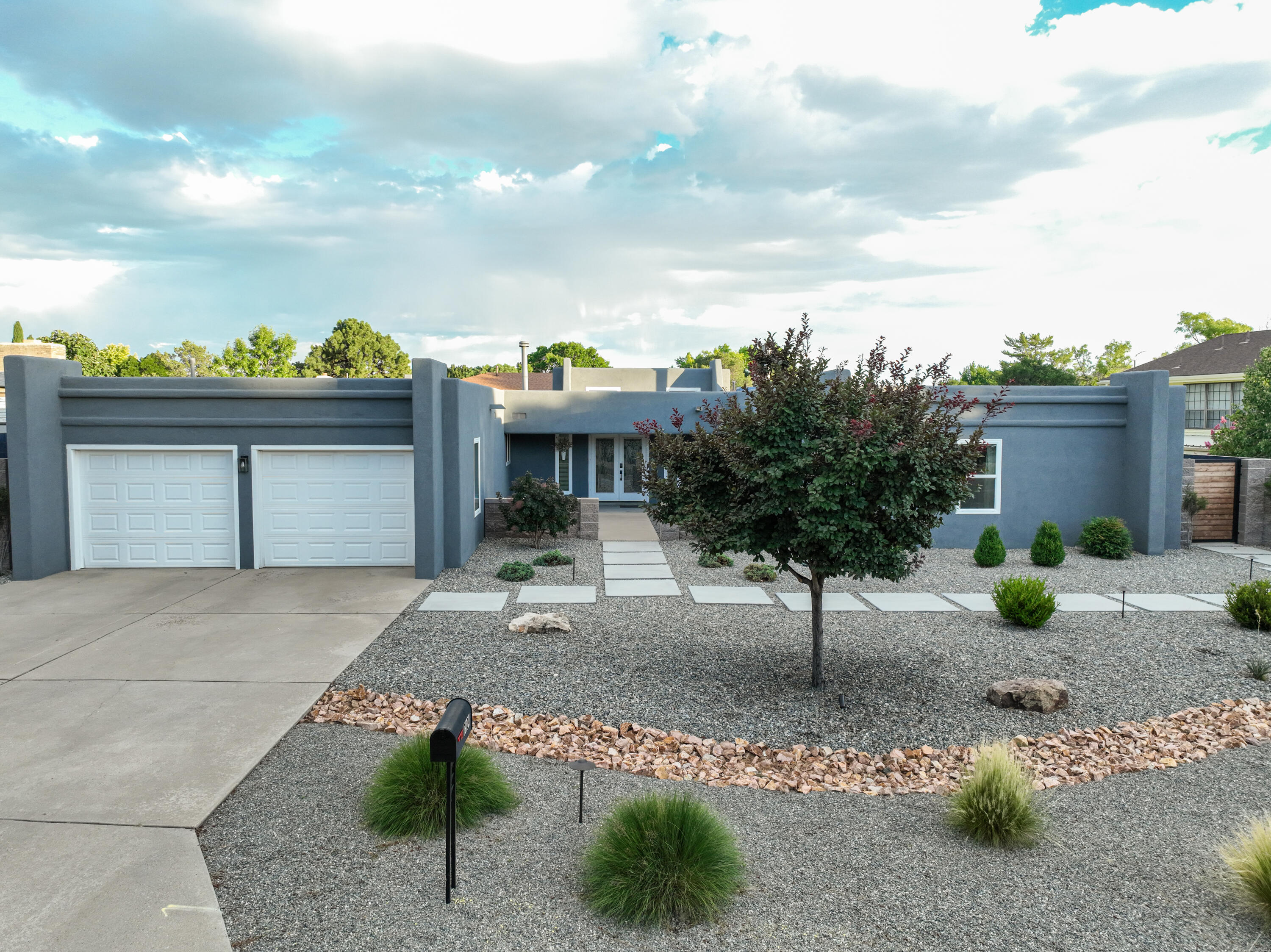 Location, location, location. A rare gem, tucked away in Academy Estates, close to some of Albuquerque's best shopping and many conveniences.. Enjoy a roomy and attractive 2,800 plus sq.ft single story home with plenty of space for living and entertaining. Spacious kitchen overlooking the courtyard in the front of the home. Large bedrooms tucked away from the main living areas. Fantastic curb appeal with beautifully landscaped with low-maintenance xeriscaping in front and back yard. 1/4 acre lot. This is truly move in ready and one of a kind.