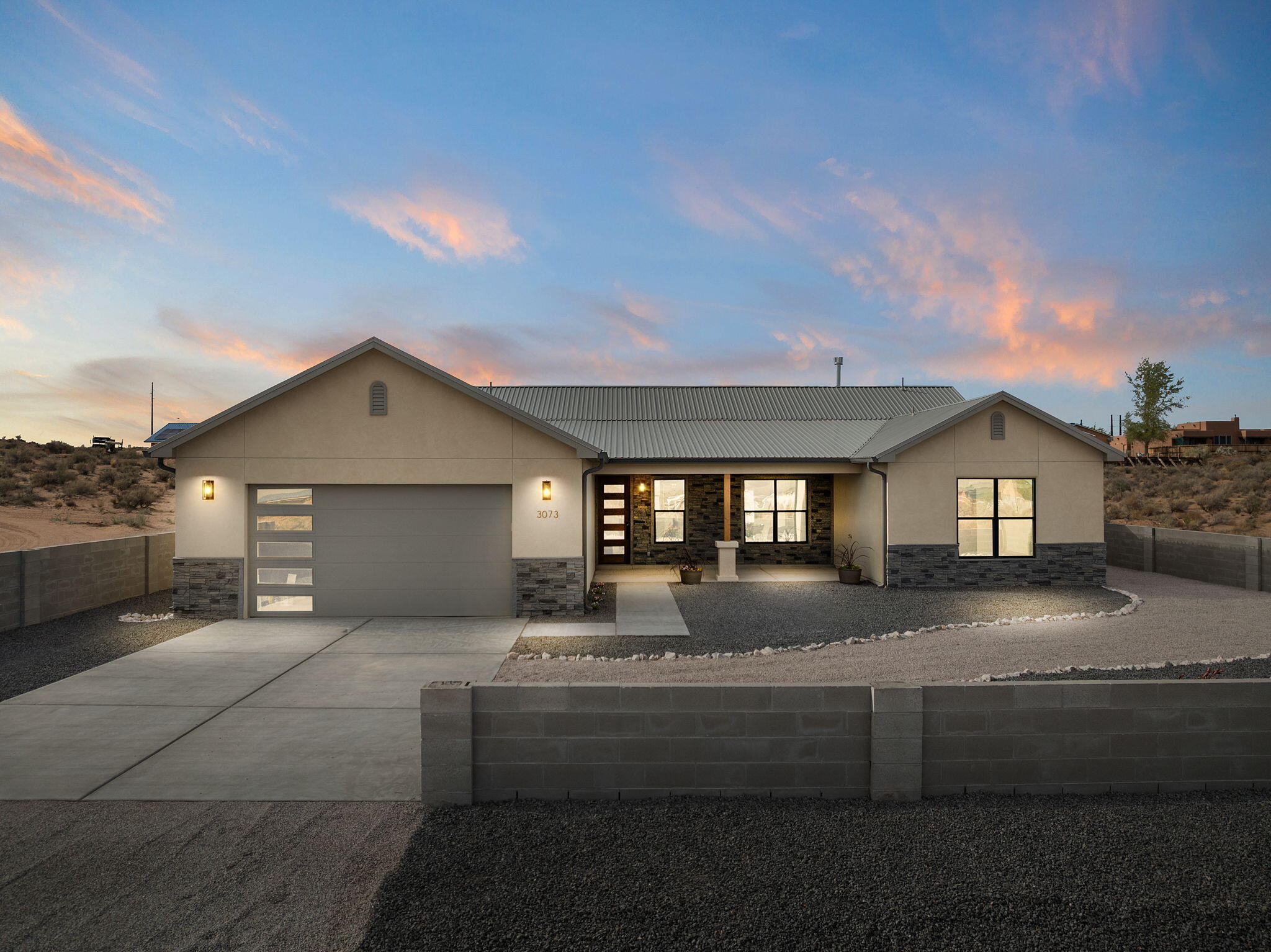 Welcome to your ideal home, where modern design meets everyday convenience located near schools, parks, restaurants, and shopping! This beautifully crafted property features stunning mountain views right from the front yard, creating the perfect backdrop for daily sunsets and peaceful mornings. The spacious open floor plan boasts a chef's kitchen with custom cabinetry, a statement island, and designer tile work. Cozy up by the stone fireplace in the inviting living room or retreat to the luxurious primary suite with a spa-inspired bathroom. Situated on a large, fully fenced lot with plenty of space to make your own, this home offers both privacy and breathtaking natural beauty. Experience refinedliving with all the comforts of a new, thoughtfully designed build and unforgettable views!