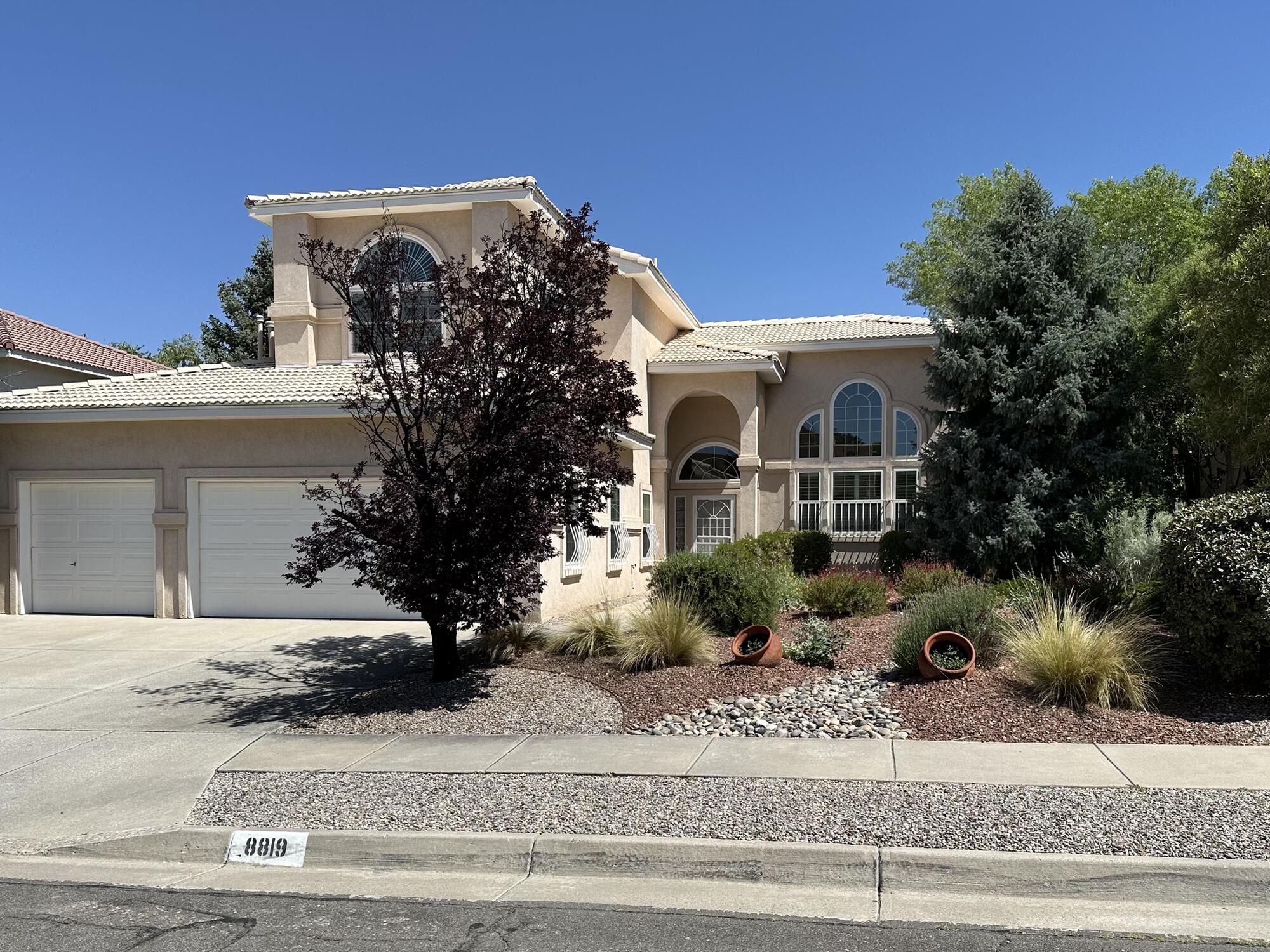 Home in the highly desirable Vineyard Estates. Light and bright with soaring ceilings and large windows. Plantation shutters in front rooms, wrought iron security doors and window guards on the first floor.  Two dining areas, and a kitchen that opens to the family room.  An elegant primary suite with sitting room, private balcony, and a spacious bathroom with jetted tub and walk-in closet. An entertainer's backyard with Gunite pool and spa, covered patio and gazebo.  Mature landscaping and a sculptured xeriscape front yard.  Storage space galore inside and outside (including newish large barn-style Tuff-Shed).  New plumbing with Pex in 2014.  New vinyl double-pane high-e windows in 2017.