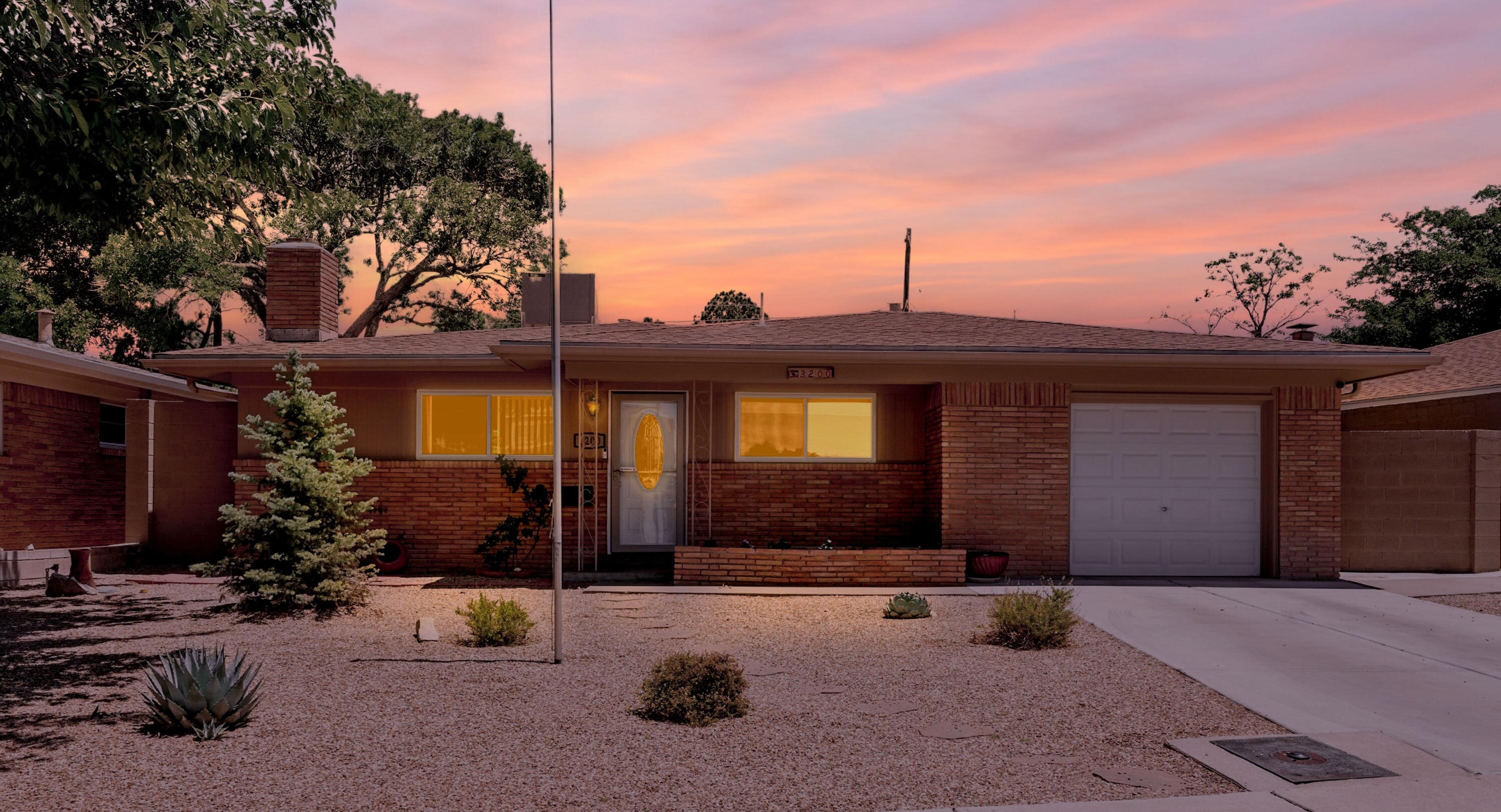 Welcome to this beautifully updated 3-Bd/2-Bath home in a desirable &  established NE neighborhood! 1,625 sq ft of thoughtfully designed living space, this home blends modern updates w/ timeless charm. The kitchen is a true standout--complete w/ sleek granite countertops and newer tile flooring that flows seamlessly throughout the home. Both bathrooms have been tastefully modernized, offering a fresh, clean feel. An inviting living room features a classic wood-burning fireplace that adds warmth and character.  Upgraded 2AMP Electric! Step outside to a low-maintenance backyard with a covered porch--perfect for enjoying peaceful mornings or entertaining guests. Located close to schools, parks, and everyday conveniences, this home is a must-see for buyers looking for comfort, style & location.