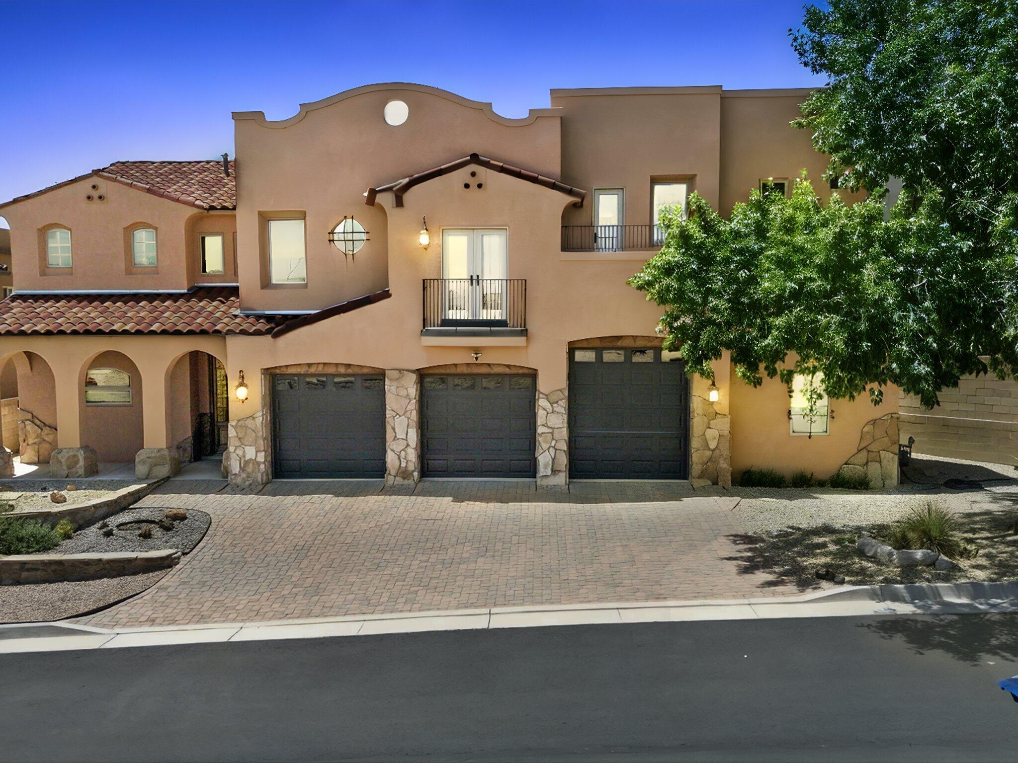 'Casa con La Vista'' House with the View! This Exquisite custom home with stunning views situated in a gated community is ready for you! Enter the grand foyer through gorgeous Spain imported front double doors. This home was built to embrace Mountain, Sunrise and Moonrise Views. Double Primary Suites Floor plan! Amazing gourmet Kitchen with custom cabinets and built in Thermador appliances. The Primary Master Suite with plaster walls has breathtaking views & spa like en suite w/ double shower, jetted tub and large walk in closet. HUGE heated 3 car garage with storage shelving, work bench, and 220v for your electric vehicle. 1 bay has an oversized RV door. Pella Doors and Windows throughout. Minutes to the Bosque, lots of restaurants & retail, and perfectly located between Santa Fe & Abq