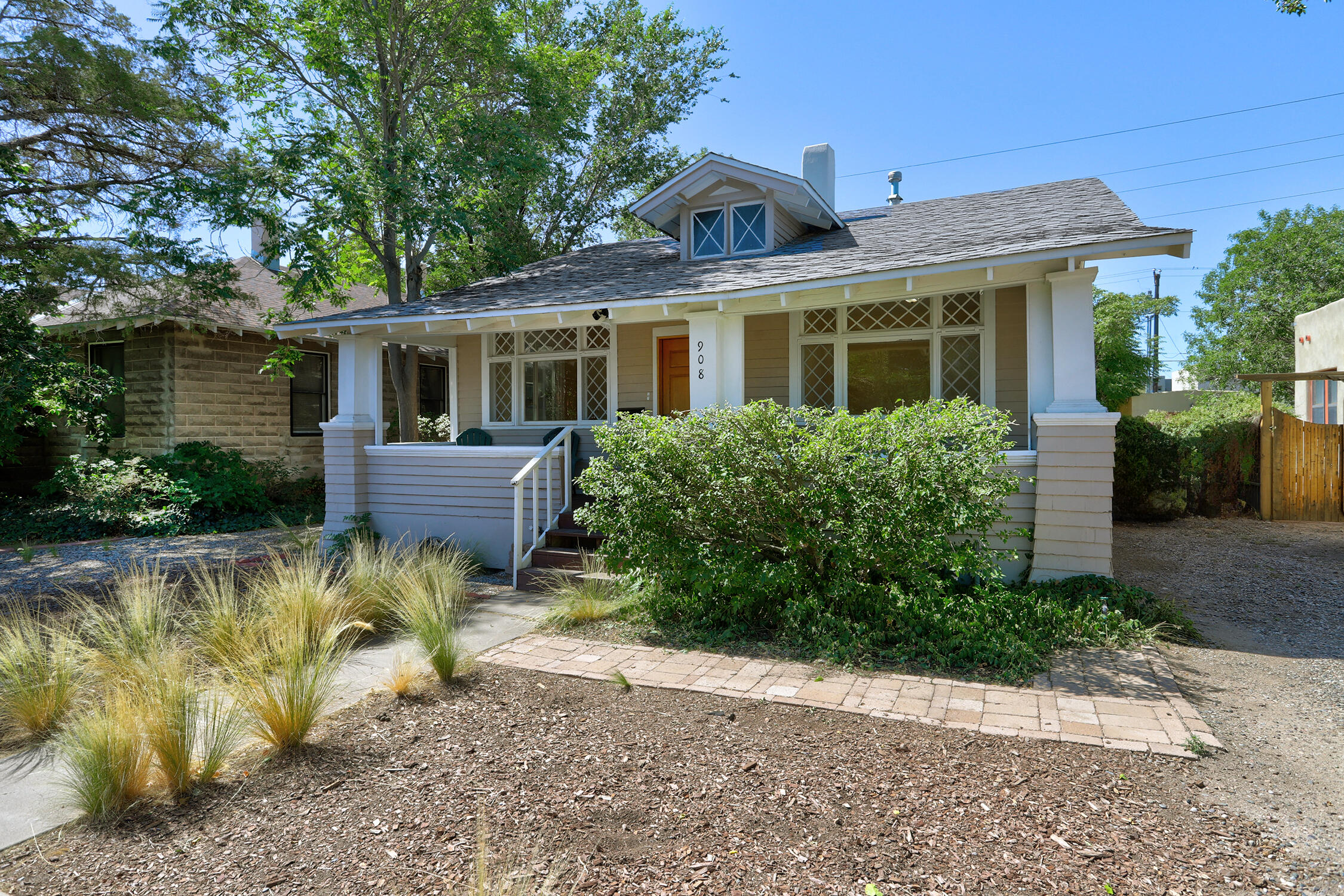 Downtown gem! Check out this charming Victorian-style home with 2 bedrooms, 1 bath, and 1,120 sqft of living space on a spacious lot. The backyard offers great access and plenty of room to expand. This home boasts fresh paint, an updated bathroom and kitchen, a large back patio, and a utility room with space for a washer, dryer, and refrigerated A/C. Full of amazing character, this classic and well-built home won't last long--make it yours today!