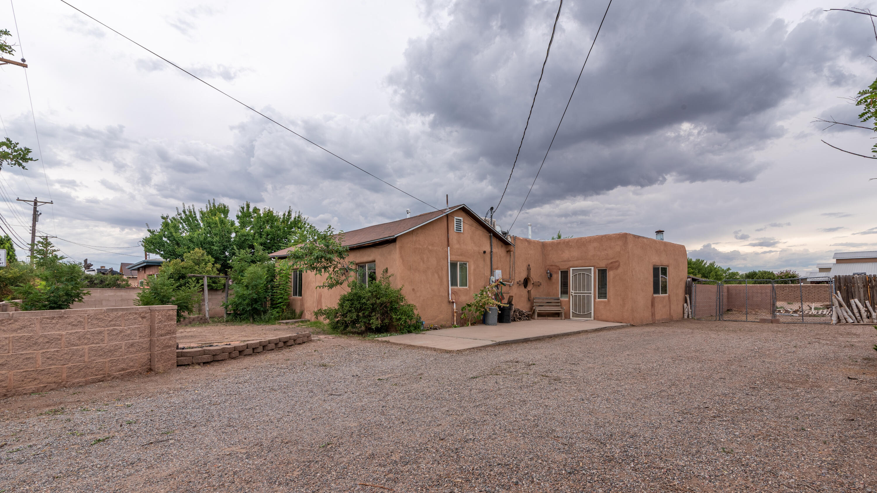 Precious Rambling Adobe in ABQ's Treasured North Valley Area of Rio Grande & Griegos Blvd, Under $300K!!  4627 San Isidro NW Boasts it's Original Charm with Comfortable Spaces.  Viga and Latilla Ceilings, Updated Thermal Windows, Brand New Heating, 1400+ SQFT, 2 Bedrooms, 2 Bathrooms, Big Kitchen, Cornered Wood Stove, Cool Window Views and Fantastic Light!  We Love The Potential & Opportunity Here and Priced Accordingly.  Check the Comps!  Note:  Driveway Contains an Easement Running E&W on N. Side.  Cute, Cute, Don't Miss!! OPEN HOUSE SATURDAY 7/26 FROM 11AM-2PM!