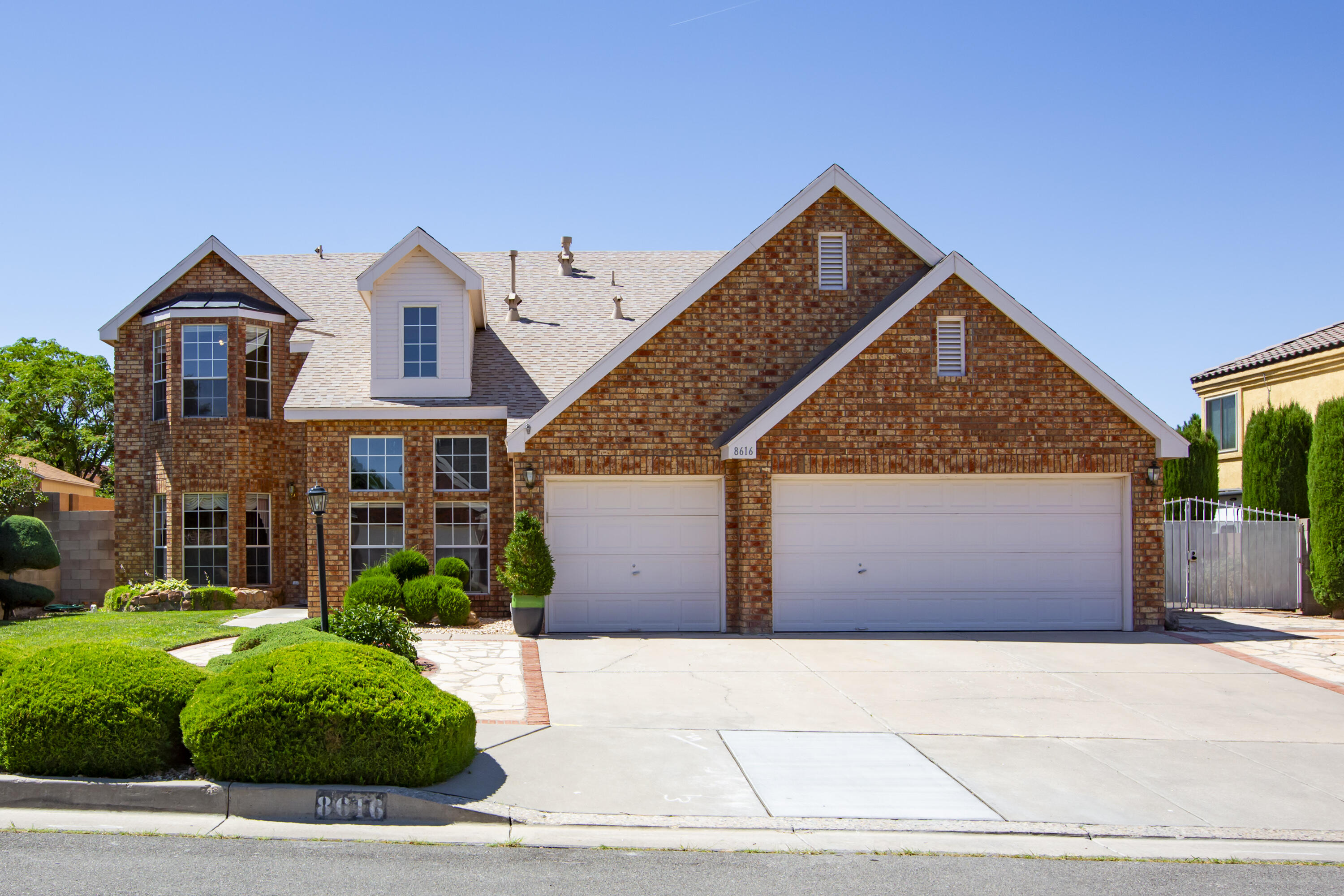 Stunning Sivage Thomas home with 5 beds, 4 baths, and over 3,000 sq ft of beautifully designed space. The kitchen features granite countertops, a gas range, and ample cabinetry, seamlessly opening to the living area. A formal dining room and an additional living space provide flexibility for hosting or relaxing at home. The primary suite is conveniently located on the main floor and offers double sinks, two walk-in closets, and a large garden tub. Upstairs has four bedrooms, two with a Jack & Jill bath and two more generous sized rooms with a shared full bath. Enjoy the private backyard with covered patio, grassy area, sparkling pool, and hot tub.Conveniently located near shopping, grocery stores, and dining, don't miss this one!