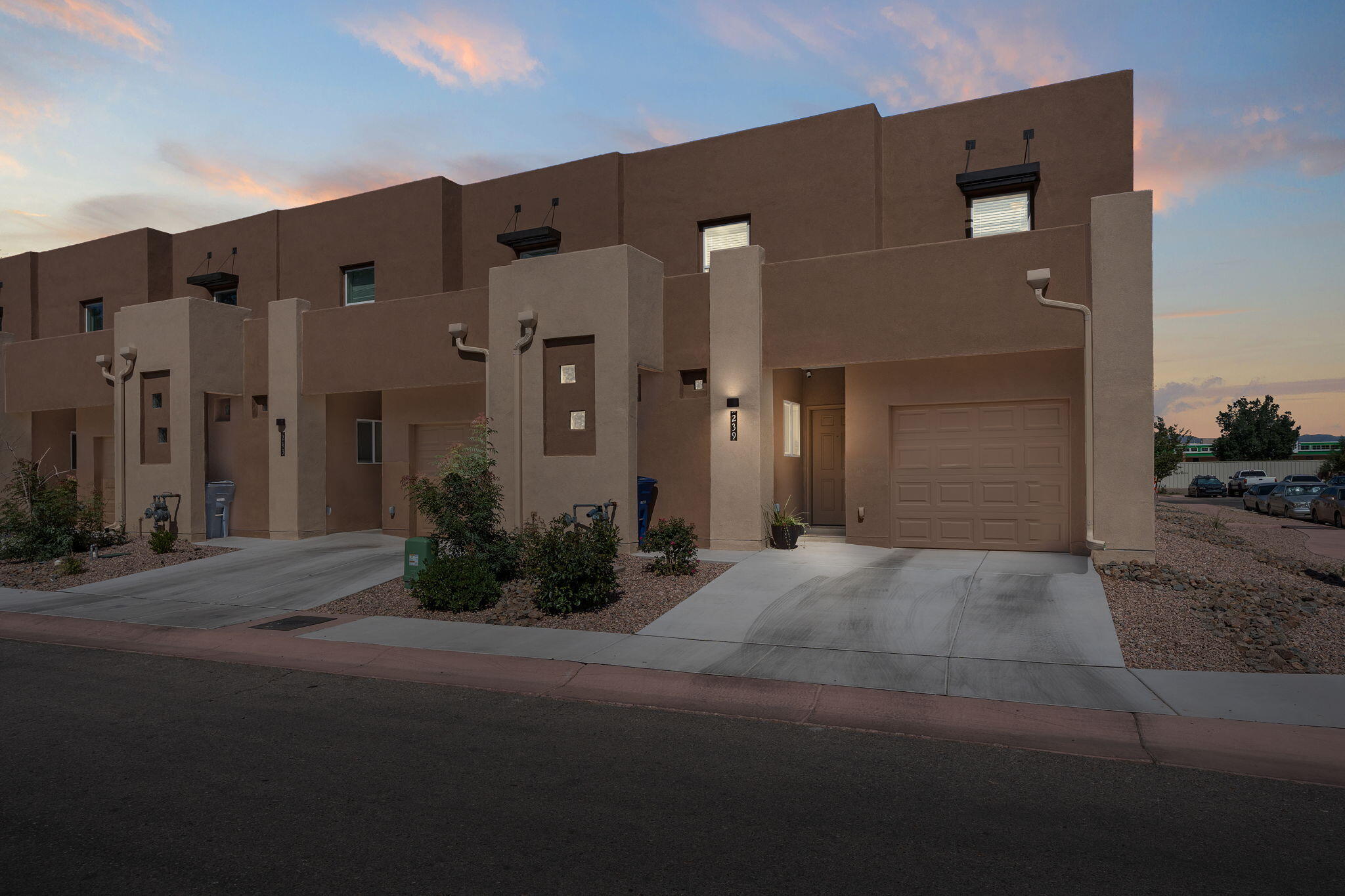 Luxury Living in the Heart of the North Valley! This thoughtfully designed town home features 1,999sf with 2 owner suites,2 guest rooms and a dedicated office space with French doors! Chef-inspired kitchen with granite countertops, upgraded cabinetry, a gas stove, pantry, fridge and a convenient bar, all overlooking a bright, open-concept living and dining area. Spacious living area with upgraded vinyl wood look floors! First floor guest suite and bath! Upstairs, the primary owner's suite offers a spa-like retreat with double sinks and a luxurious garden tub. Low maintenance back yard, fully walled with a covered patio! North Valley living, near schools, shopping, Sawmill and more!
