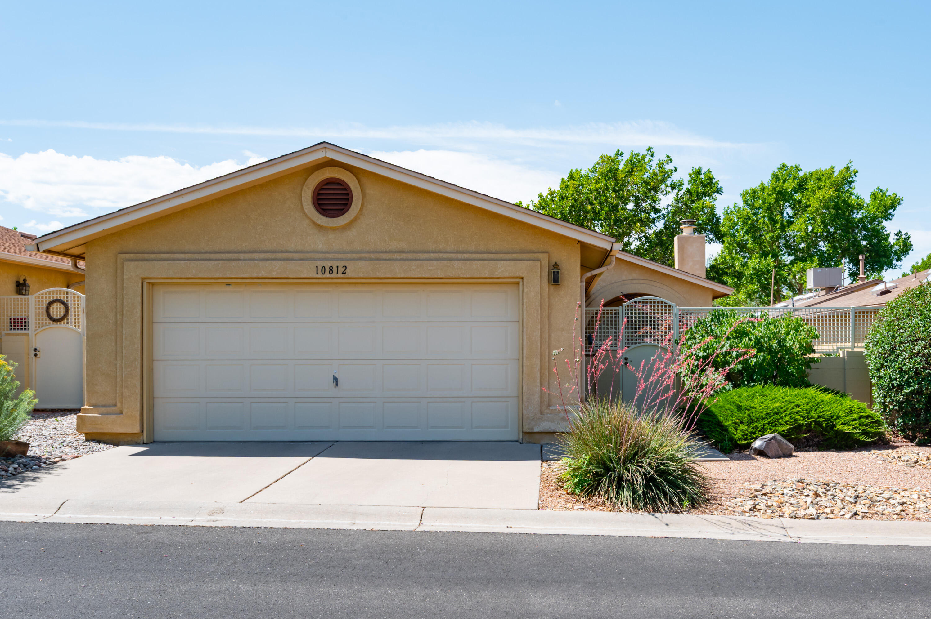 Renovated Towne Park Beauty. Enjoy the amenities this gated community has to offer, 2 pools, community center, fitness center, tennis courts & natural trails. HOA also covers front yard maintenance and security gates. Land is OWNED. Light filled the great room with an open floor plan concept. Skylights. The kitchen is the beauty here. Breakfast nook, ample granite countertop, custom cabinets, built in oven and microwave. Gas cooktop. 2 good sized bedrooms, walk in closets. 2 stylish bathrooms. Refrigerated air. Many upgrades in this sweet home.Near KAFB, Sandia Labs. shopping, restaurants and access to I-40.