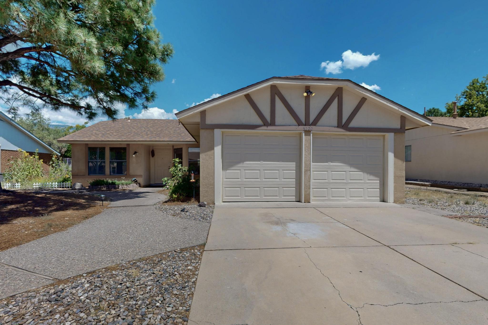 What a fantastic opportunity to own a home in one of the most desirable neighborhoods in Albuquerque!! Situated right near the SY Jackson school district, this home offers a premium NE Heights location near parks, popular shopping, desirable school districts and so much more!  An uncommonly large lot with a beautiful backyard for the warm NM nights.  The primary bedroom offers plenty of space and both bathrooms have upgraded tile.   For the cooler winter months, your brick fireplace will keep you cozy and warm throughout the night.   For the summer months, ceiling fans and refrigerated air will be sure to keep you cool.   With tile flooring in all the wet areas this house is sure to impress!!  New roof is less than 1 year old, water heater is only 3-4 years old!