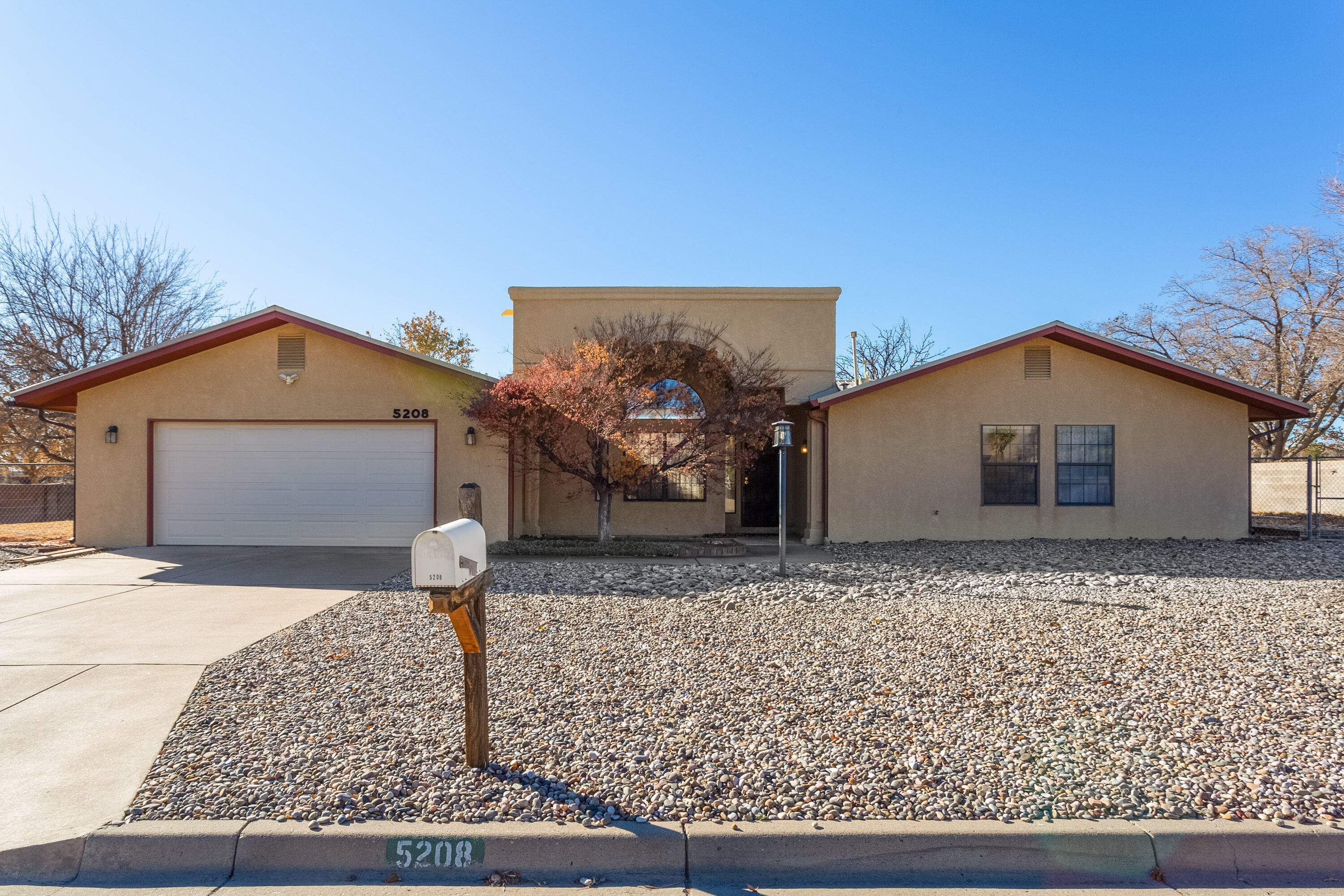 RARE GOLF COURSE LOT home with backyard access to course! This home features tall beautiful WOOD BEAM ceilings, along with 2 large living areas with a wood burning stove and wet bar. Home is being sold AS-IS. Seller WILL NOT make any repairs. Don't miss out on this great opportunity, it won't last long! Grab your favorite realtor and stop by today!