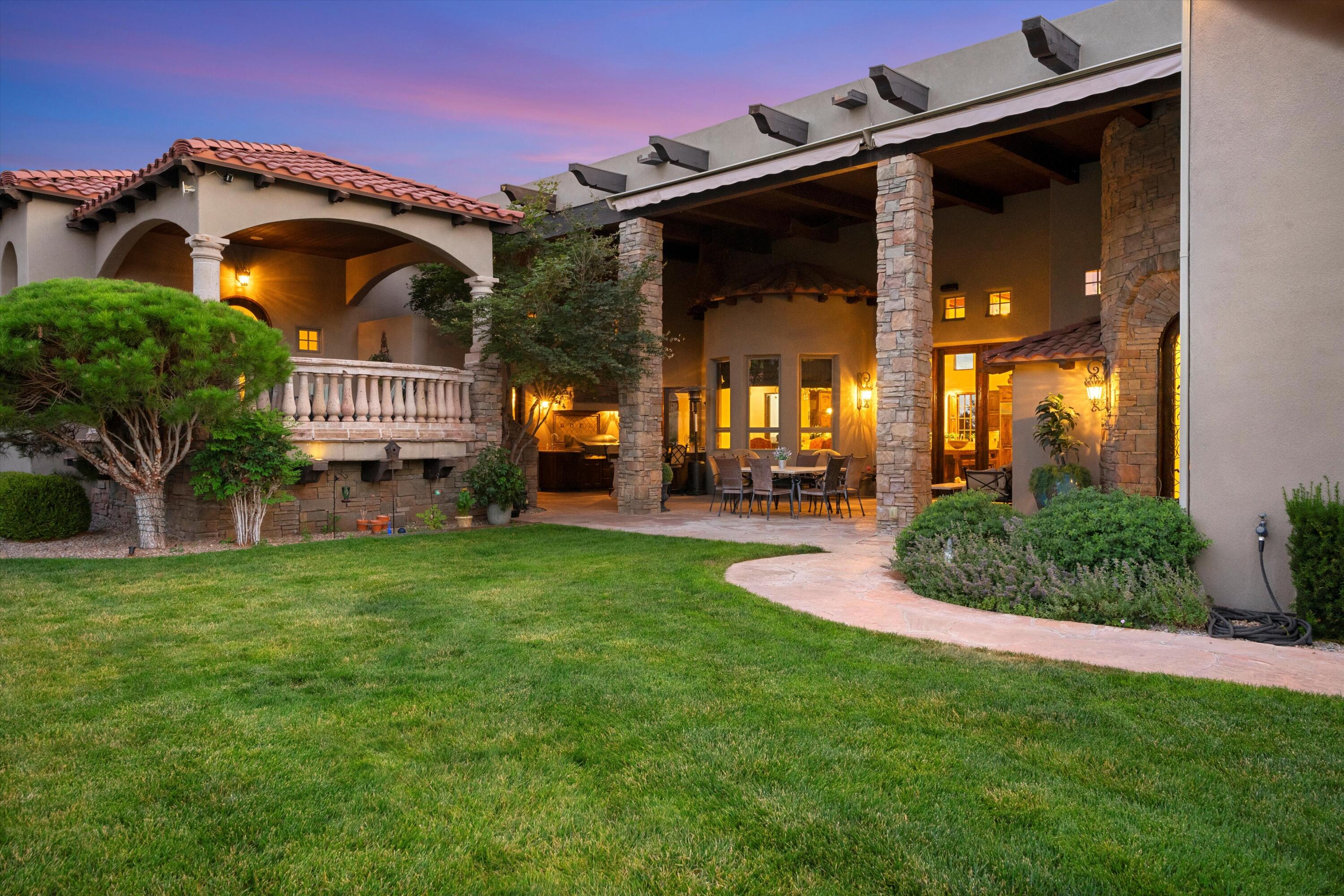 This timeless Tuscan estate is located in one of Albuquerque's most desirable areas, in a securely gated community, with fabulous views of the majestic Sandia Mountains. As you enter the home you are greeted by soaring ceilings with solid gable accents, Travertine floors, Cantera stone fireplaces, and custom hand-axed cabinets and doors. The kitchen is a chef's delight with a six burner Wolf stove, double ovens, and two built in dishwashers.  House contains a game room, movie theatre room, heated pool and outdoor kitchen.  6,822 Total SF | 5,550 SF main home,  4 bedrooms, 6 bathrooms (each bedroom has an ensuite and walk-in closet) 3 car garage | 1,052 SF casita with 1 bedroom, 1 bathroom and 2 car garage | 220 SF Pool House,