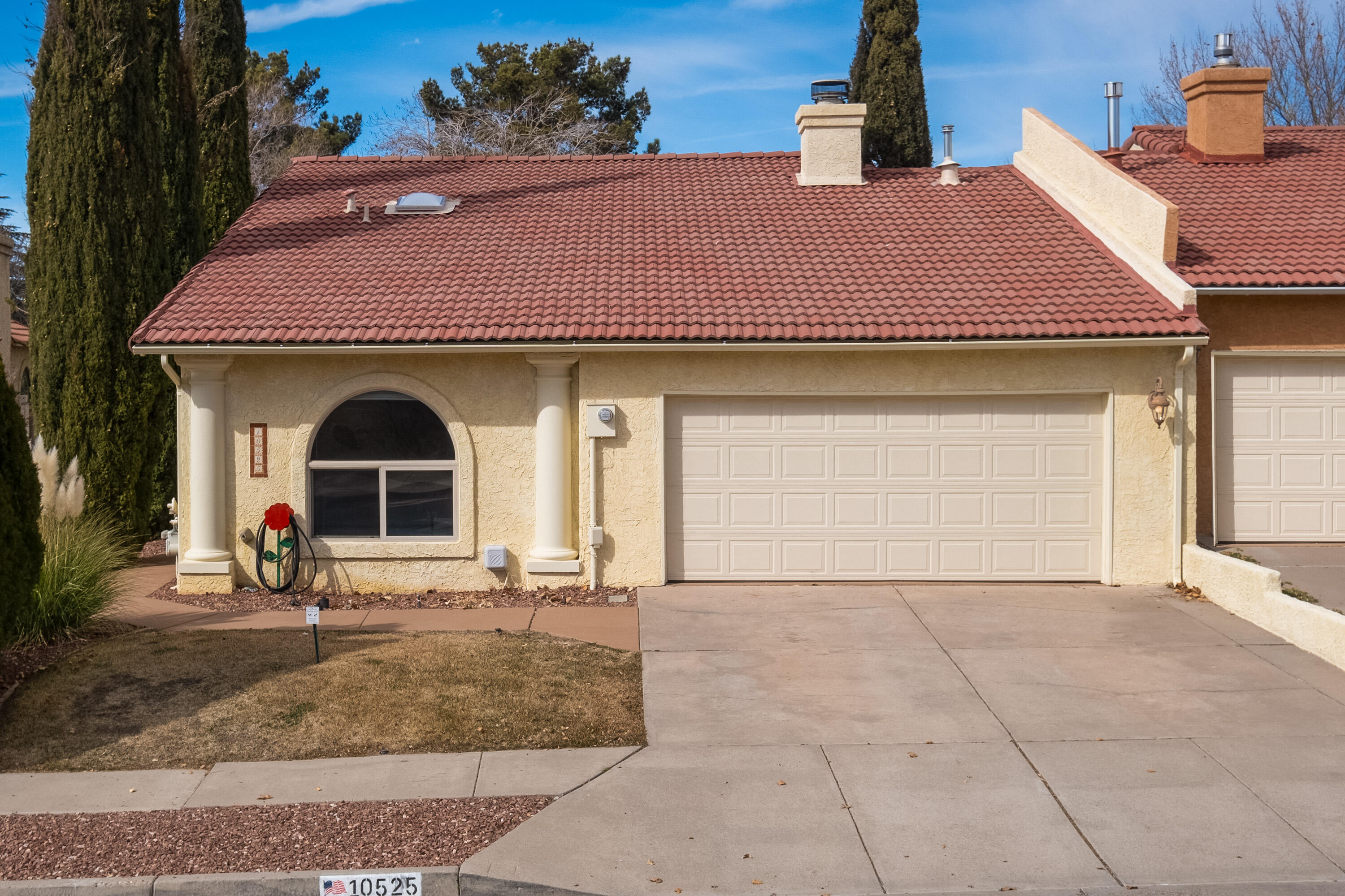 Welcome to this move-in-ready home nestled in the North East Heights of Albuquerque. A meticulously cared for 3 bedroom, 2 bathroom townhouse offers both comfort and convenience. This home has a spacious layout flooded with natural light, perfect for everyday living and entertaining. The private patio offers a peaceful retreat, while the beautiful backyard with a covered patio is perfect for outdoor gatherings and relaxation. With an oversized 2-car garage, there's plenty of space for storage and parking. Enjoy the nearby amenities, including restaurants, grocery stores, and shopping. This townhouse is ready to welcome you home - schedule a showing today and make it yours!