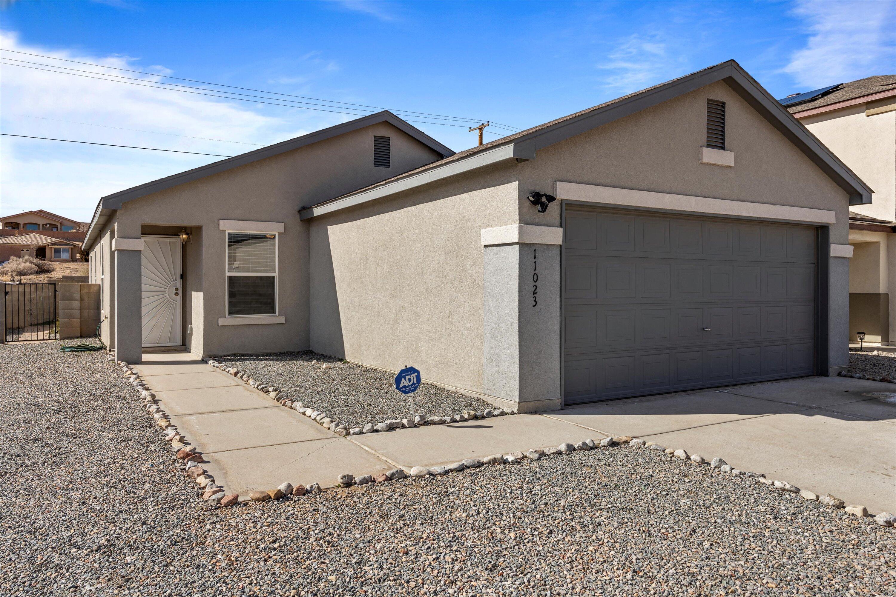 Welcome to your charming oasis at 11023 PARK NORTH Avenue, nestled in the heart of the vibrant westside of Albuquerque, New Mexico. This inviting abode is more than just a house--it's a gateway to a lifestyle filled with convenience, comfort, and endless possibilities.Conveniently located near Rust Hospital, CNM West, shopping centers, delectable dining options, and picturesque parks, this move-in ready home offers the perfect blend of accessibility and tranquility.Step inside and be greeted by an open living room seamlessly connected to the eat-in kitchen, providing unobstructed sight lines from the front to the back. The primary bedroom boasts a spacious en-suite bathroom, offering a serene retreat at the end of each day. Need a dedicated workspace?