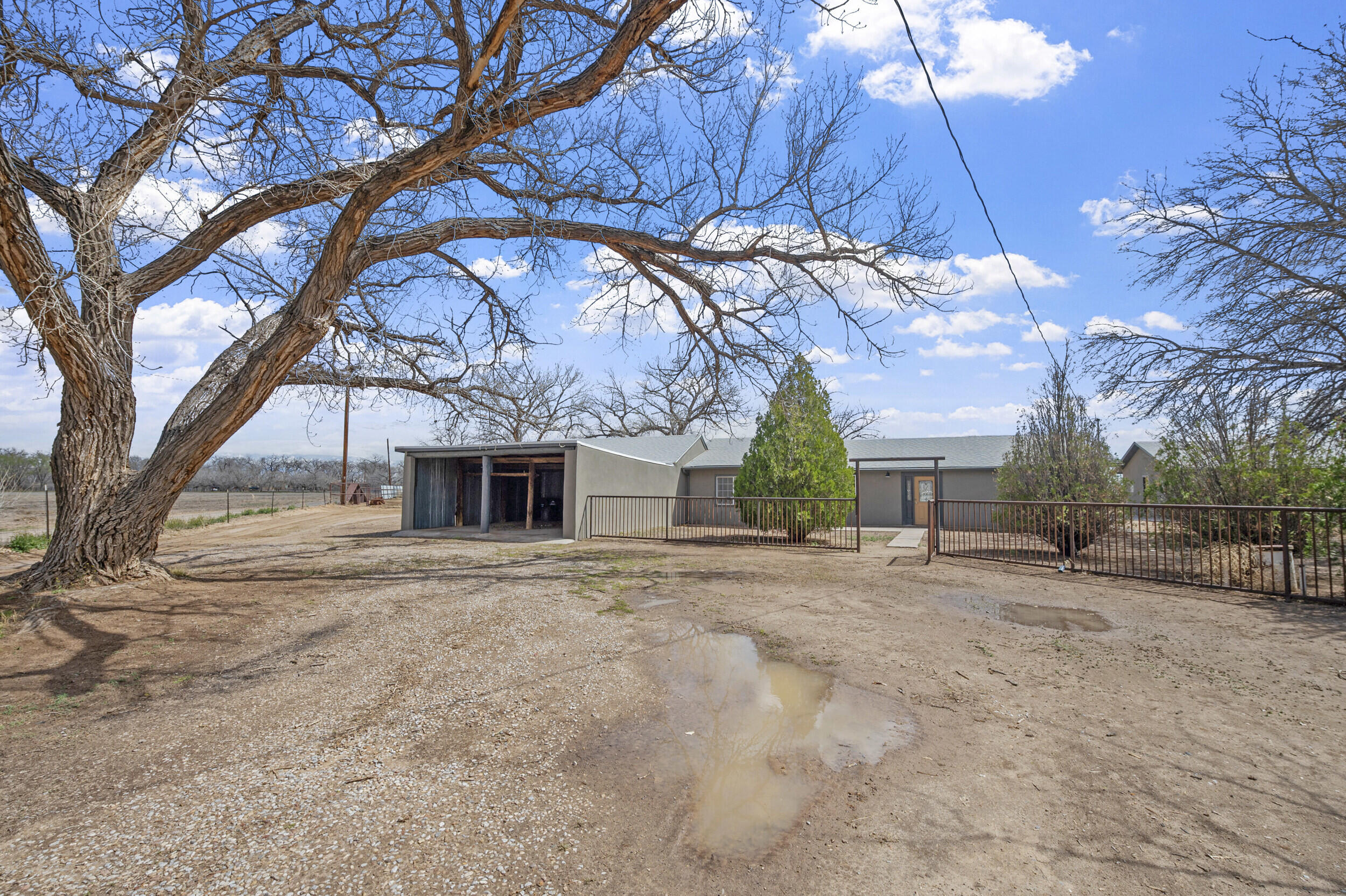 Perfectly tucked away on 4.28 acres is this remodeled home with casita and a 40X30 Shop.  Main home is 1564 sqft, 3 bedrooms, 2 bathrooms. Casita is 576 sqft, one bedroom, bathroom and cute living/kitchen area.