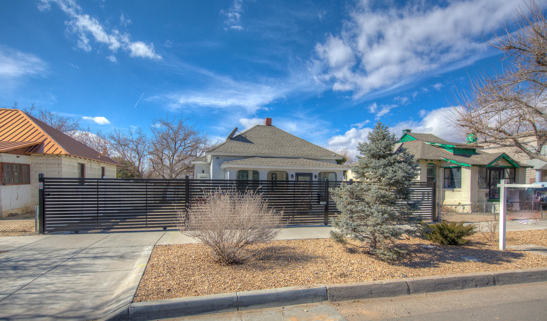 Beautiful single story home in Downtown Albuquerque.this charming 2 bedroom 1 bath home with original hardwood floors is open light and bright.Seller has recently added tankless water heater, central / Refrigerated A/C. new windows and doors, new appliances, granite counter tops are just some of the updates. Livingroom is full of light and opens to large dining room. A bonus space not included in Sq footage is the full size attic perfect for office studio or tons of storage.The home additionally has back yard access with additional access thru ally. A large detached storage or studio is another bonus. The home is warm and inviting and a must see.