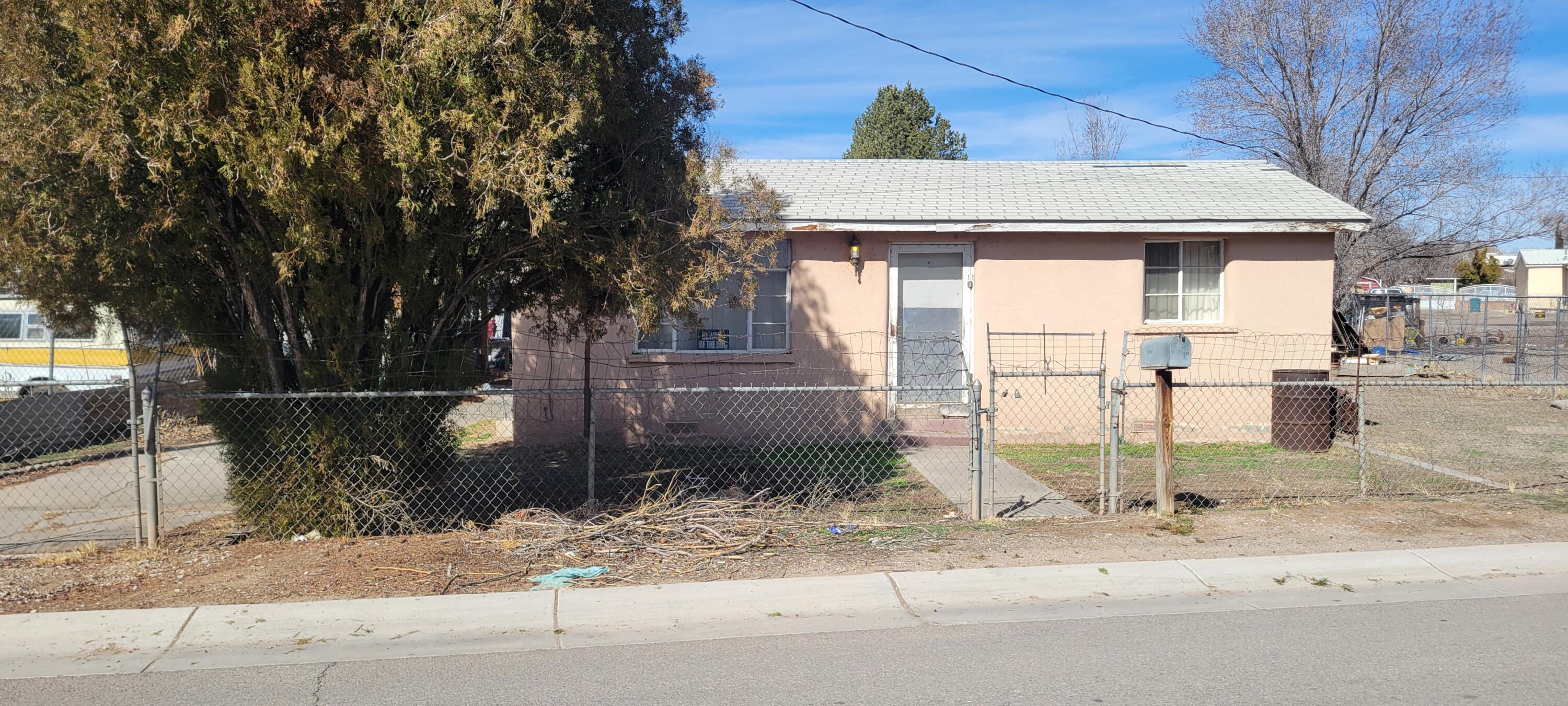 Located in the Heart of the South Valley, this 0.16 acre lot, FIXER-UPPER is Ideal for anyone who can ''renovate.'' Property needs repairs. There is opportunity to have more than just the main house on property. (Think workshop or casita). Selling As-Is.