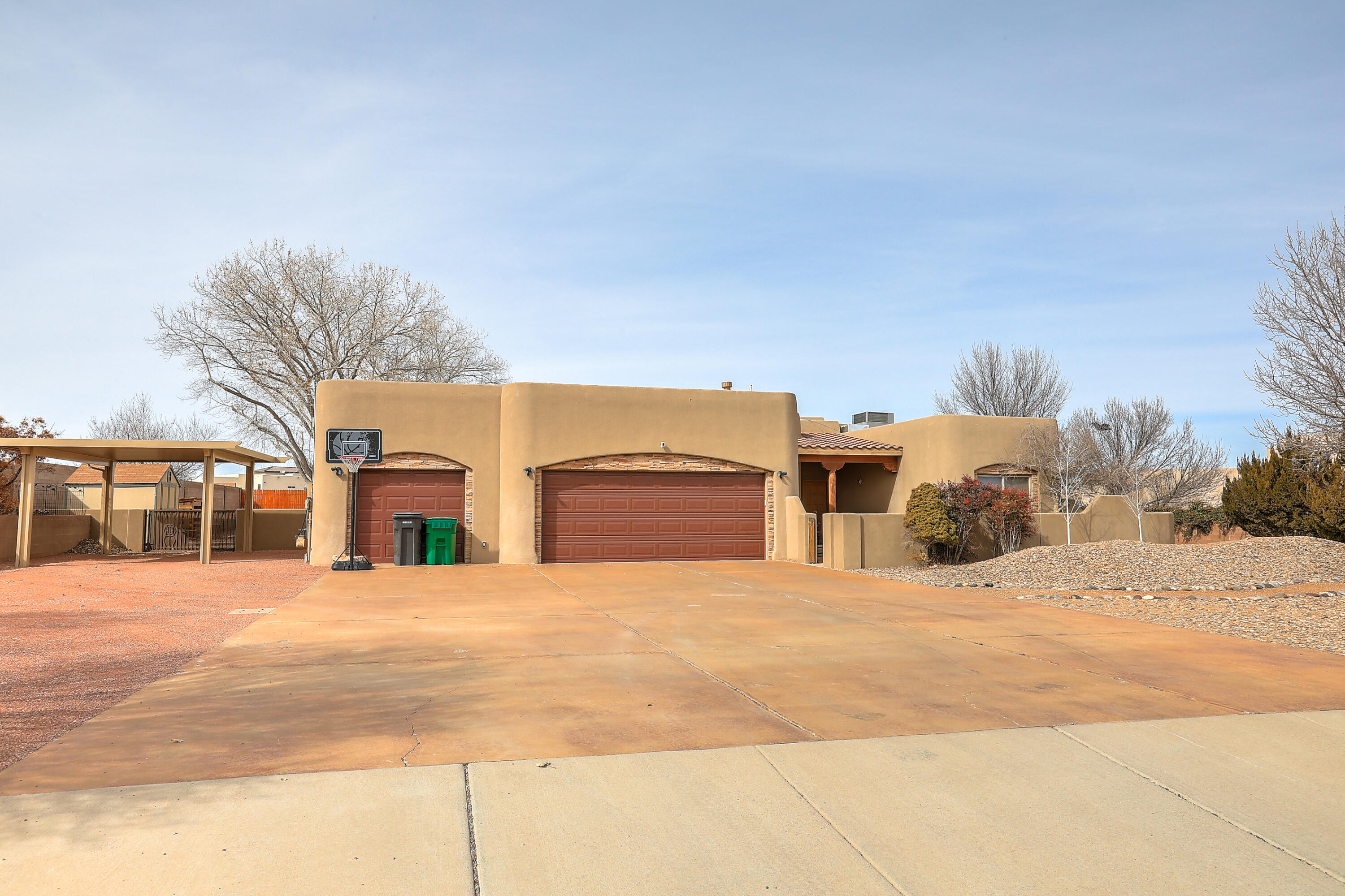OPEN HOUSE SATURDAY MARCH 2 FROM 11:00-1:00 PM AND 2:00-4:00 PM!!! Welcome to this stunning home in the heart of Rio Rancho! This property offers a perfect blend of convenience and tranquility, with its proximity to schools, restaurants, a swimming pool, and hospitals. The spacious layout and privacy make it an ideal retreat, providing a peaceful sanctuary for you and your family. The outdoor space is a true gem, featuring a pizza oven, custom barbecue, and serene mountain views, creating the perfect setting for outdoor gatherings and relaxation. Inside, the recently remodeled kitchen boasts new cabinetry, appliances, fixtures, and countertops, providing a modern and functional space for cooking and entertaining.