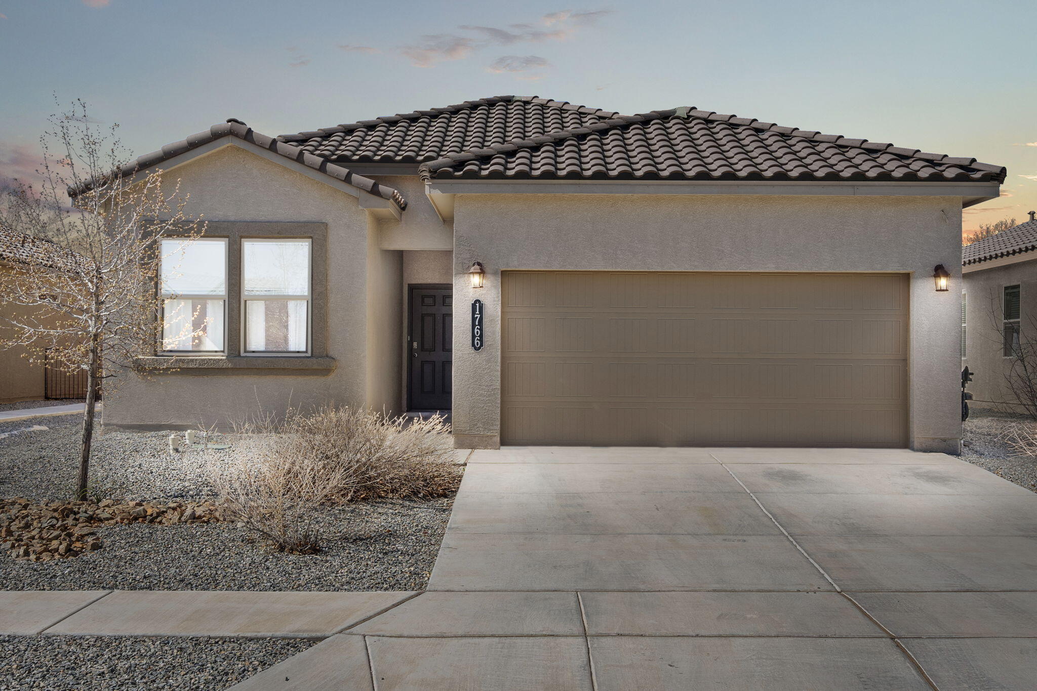 This home qualifies for a Homebuyer Grant from Chase Bank! Discover modern living in the tranquil Village of Los Lunas. This 5-year-old, single-story home features 4 bedrooms, 1 full bath, a 3/4 primary bath, and a 2-car garage. Enjoy a new freestanding gas range & oven (Feb 2024), new carpet (Feb 2024), stylish tile flooring, and refrigerated air conditioning. The low maintenance landscaped yards are a delight. Located conveniently close to shopping, dining, schools, I-25, and just 35 minutes to KAFB and Sandia Labs, it combines convenience with serene living. Miles of walkable, dog-friendly, trails. Perfect for those seeking comfort and ease and an escape from the hustle and bustle.