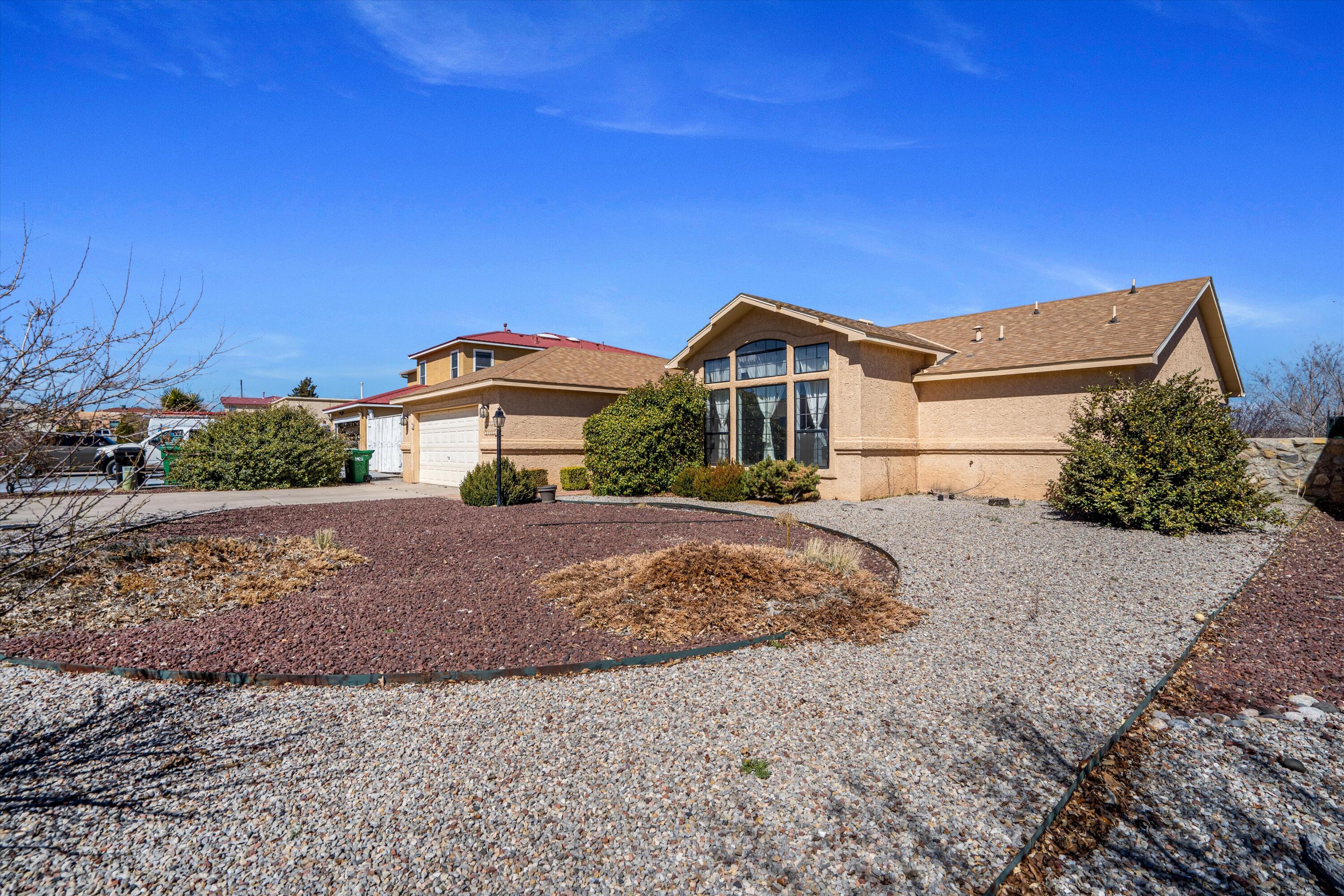Fantastic Opportunity in Rio Rancho! Don't miss out on this inviting 2-bedroom, 2-bathroom home nestled on a .20-acre lot, boasting a prime location and move-in readiness. Featuring a generous kitchen with granite countertops, a cozy breakfast nook, and a separate dining area, this home is perfect for gatherings and everyday living. Stay comfortable year-round with refrigerated air, and take advantage of the oversized garage, offering space for a potential workshop. Relax on the covered patio and soak in the stunning mountain views. Benefit from the convenience of being close to top-rated schools, restaurants, breweries, shopping centers, parks, and trails. This property offers the ideal blend of comfort, convenience, and charm - schedule a viewing today!