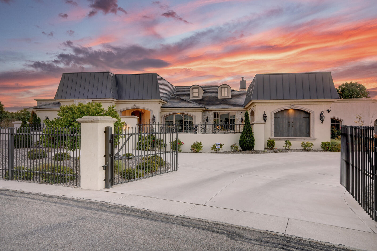 The world-traveled owners have created this stunningly elegant yet cozy home in the prestigious Black Farm Estates. In partnership with Santa Fe basedinternational designer, Eric Spurlock, the owners thoroughly thought out and executed every detail to create a home like no other. Custom details create a home that can never be duplicated. Every light, fixture, and tile have being carefully curated. Examples include Phylrich faucets, custom 18k tiles and Schonbek chandeliers. The serene outdoor spaces include a reflecting pool watched over by KarlJensen sculpture ''Freedom'' that can be enjoyed from a covered patio complete with outdoor kitchen.The cooks job is made easy with a gas cook top, double ovens, a pot filler and well laid out soft close cabinetry. Office with separate entrance.