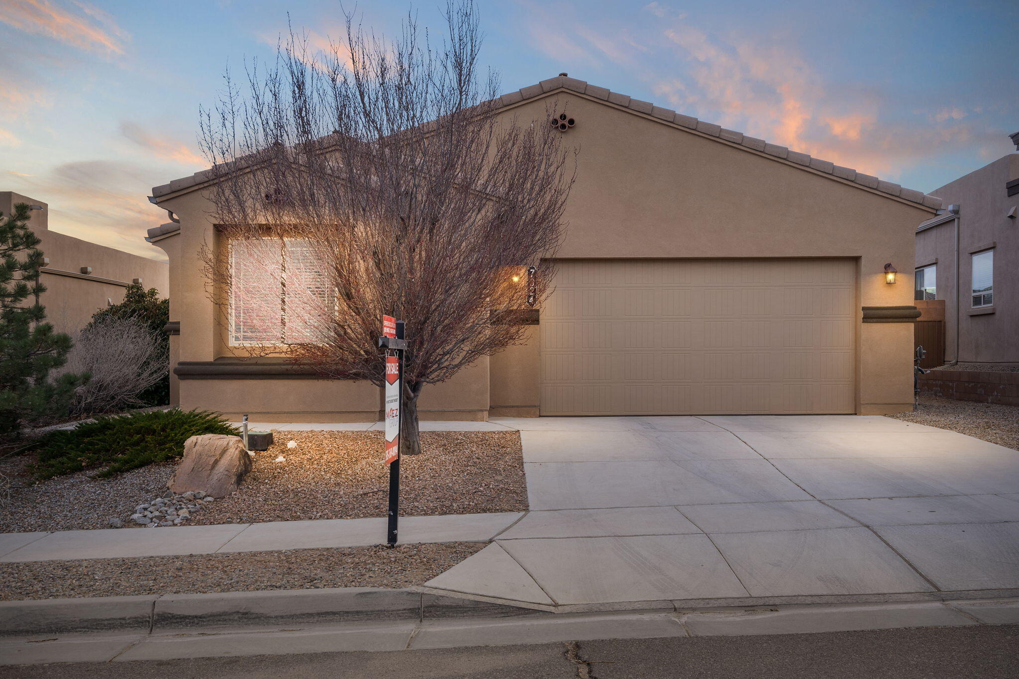 Wonderful move-in-ready NM Green Build located in the popular Valle Prado community! Home features 2,124sf with 3 bedrooms, 2 bath rooms, 2 living areas and a 2 car garage. Spacious living area with upgraded tile floors. Beautiful kitchen complete with espresso cabinetry, granite countertops, backsplash, stainless steel gas range, microwave, refrigerator, pantry, dining space and a large island with a sky chase above! 2nd living area could also make the perfect home office. Owners retreat with a private bath. Bath hosts dual sinks, a relaxing garden tub, walk-in shower and closet. Fully walled backyard with covered patio and partial turf!