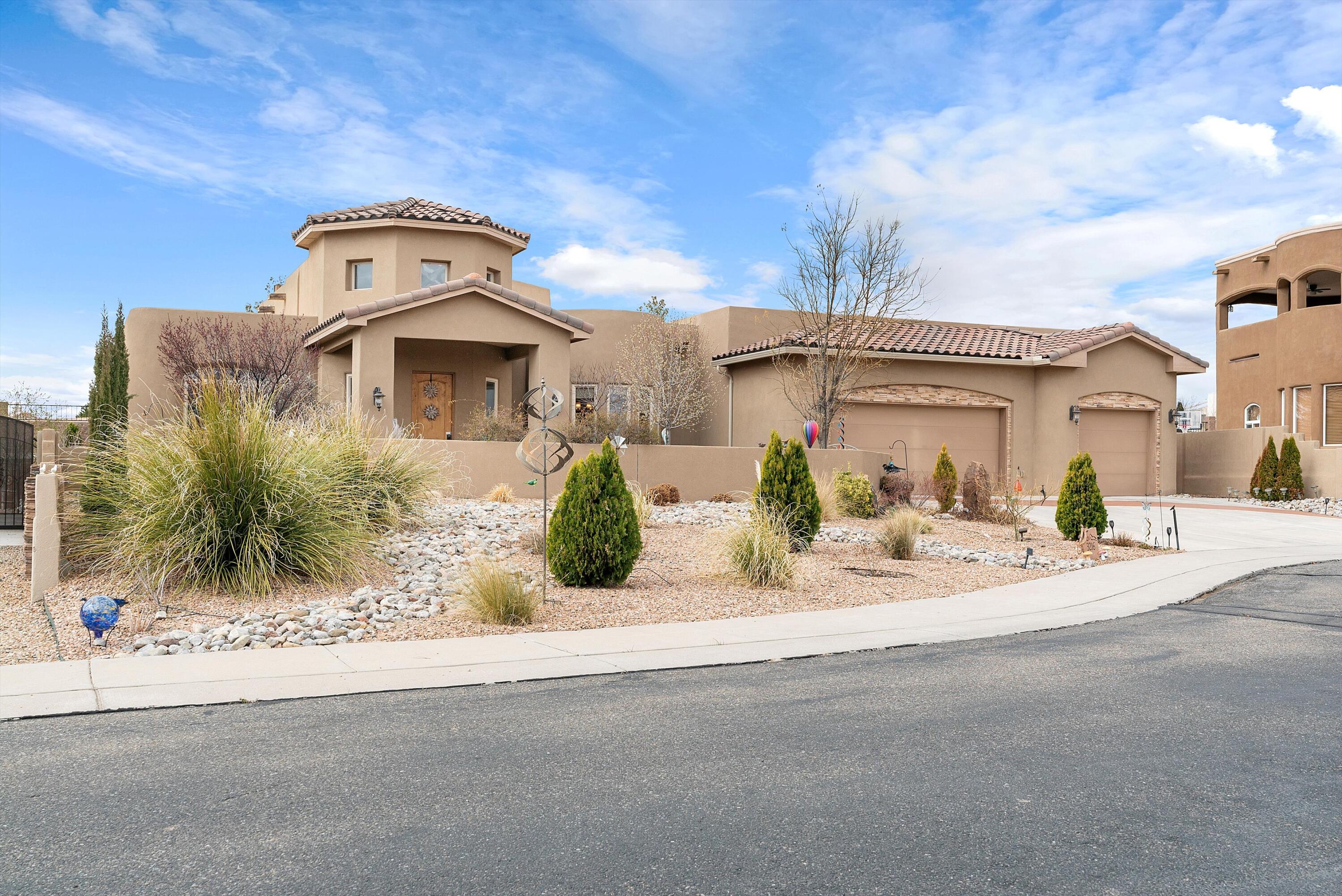 Welcome to the pinnacle of luxury living in this 2,488 square foot custom home, nestled within the prestigious Greystone Point gated community. The captivating Tuscan exterior sets a tone of timeless elegance, welcoming you into a world of refined comfort. Inside, discover an open kitchen adorned with granite countertops, and exposed beams in the living room. The convenience of a single-level layout is complemented by a 3-car garage, providing ample space for your vehicles and storage needs. Enjoy the serenity of fully landscaped front and back yards, featuring a courtyard entrance with mesmerizing mountain views. The primary bedroom features private access to the back patio, and a large master bath with walk in shower, and garden soaking tub.  Updated roof, water heater, and AC.