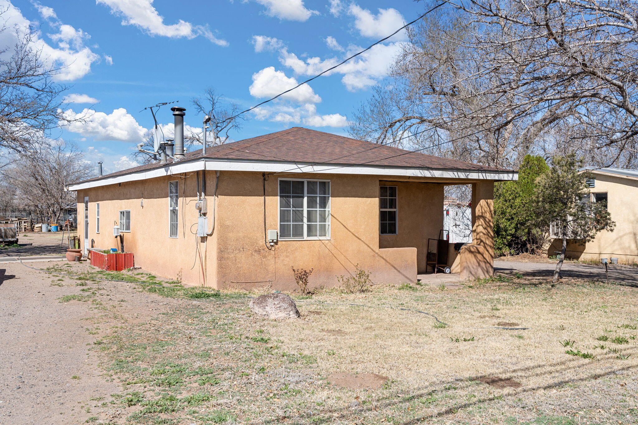 Three houses on 1 acre! live in one rent out two, main house is 3 bedrooms 1 bathroom(1075 sqf), second house is 1 bedroom 1 bathroom with kitchen and living area(703 sqf) Third is a studio apartment(493 sqf)! Room for animals, horse, pigs and chickens.
