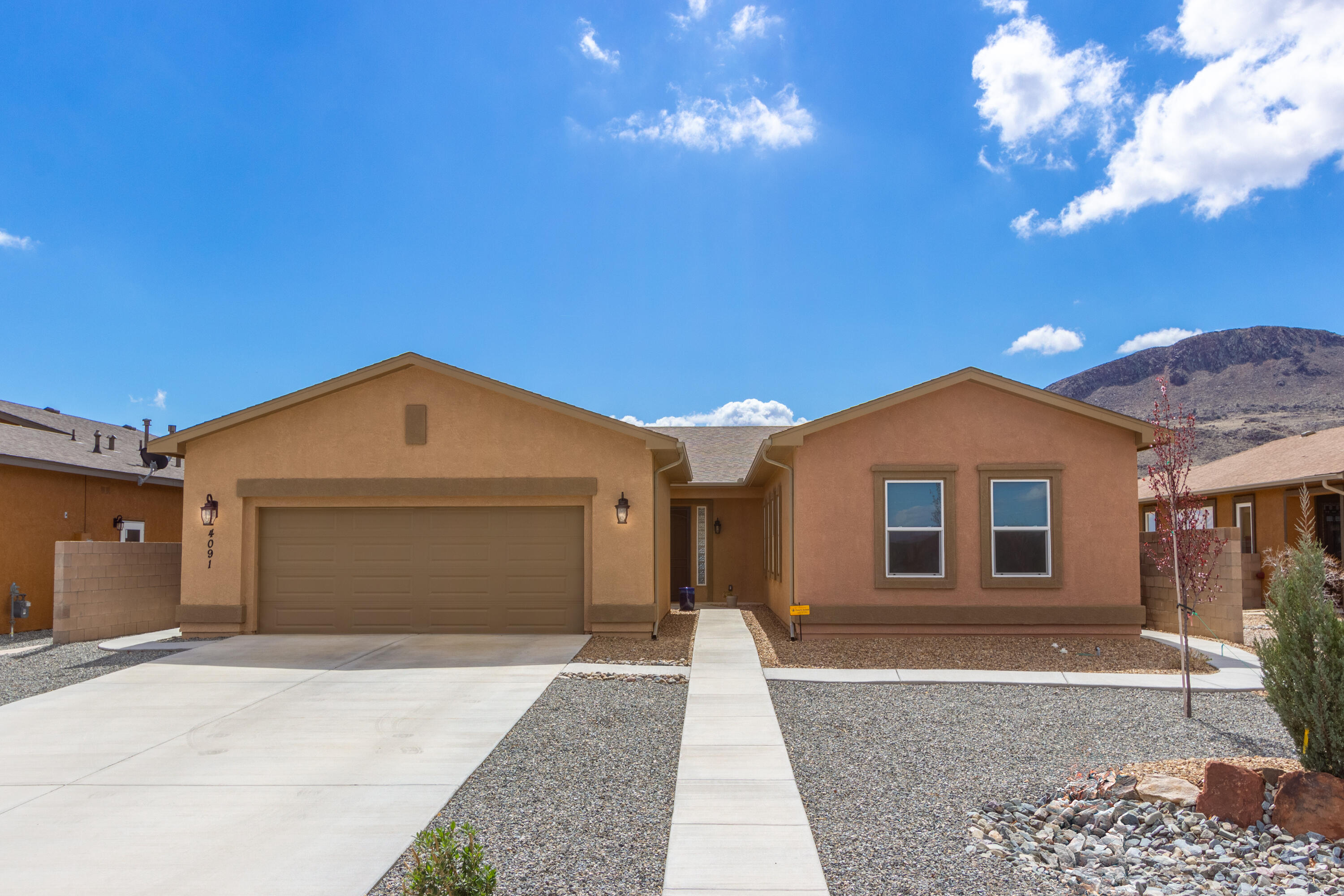 This is a gorgeous move-in ready open concept Sierra Blanca floor plan just 2+ years old! Plenty of upgrades here: tile flooring; upgraded cabinets & quartz counters w/island in kitchen; office has french doors. Fully landscaped easy care backyard with raised bed gardens. Expanded covered patio across the entire back of home. Oversized garage for lots of storage and/or workshop space. Expanded covered patio across entire back. Over $20K in Graber blinds & backyard landscaping. Neutral enough to personalize and make it yours but nothing needed to move right in. Don't forget all the wonderful Jubilee amenities: 10,000+ sq ft clubhouse w/fitness room, pool room, arts & crafts & more; newly refinished pickleball courts; pool & hot tub; dog parks; putting green & more!!