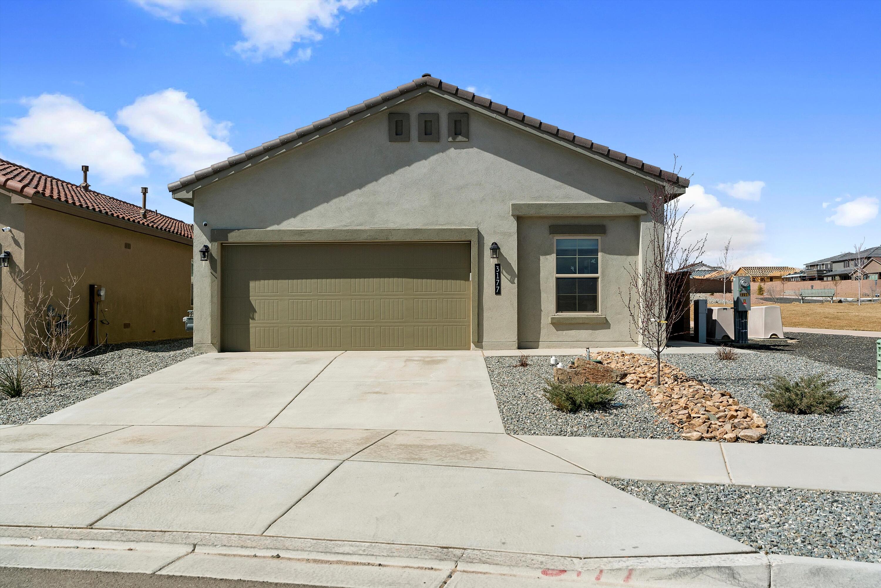 Introducing a modern DR Horton home built in 2023 on a corner lot, featuring the popular Sawyer floorplan with four bedrooms and two baths. Enjoy the open concept layout with high ceilings, quartz countertops, a kitchen island with tile backsplash, and stainless steel appliances. Stay comfortable with refrigerated air and energy-efficient windows. Outside, a decent-sized backyard with a high wall offers privacy and the perfect space for outdoor enjoyment. Experience the epitome of contemporary living in this stylish and functional home!