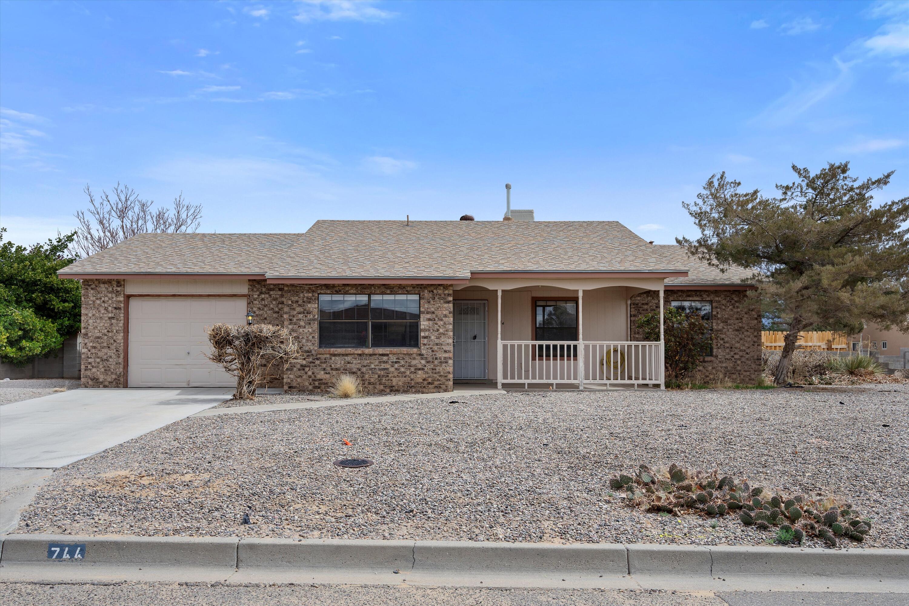 Great house on a corner lot, featuring views of the Sandias! Some updates include tile floors, kitchen cabinets, and bathrooms vanities. Do not miss your chance at this great home!
