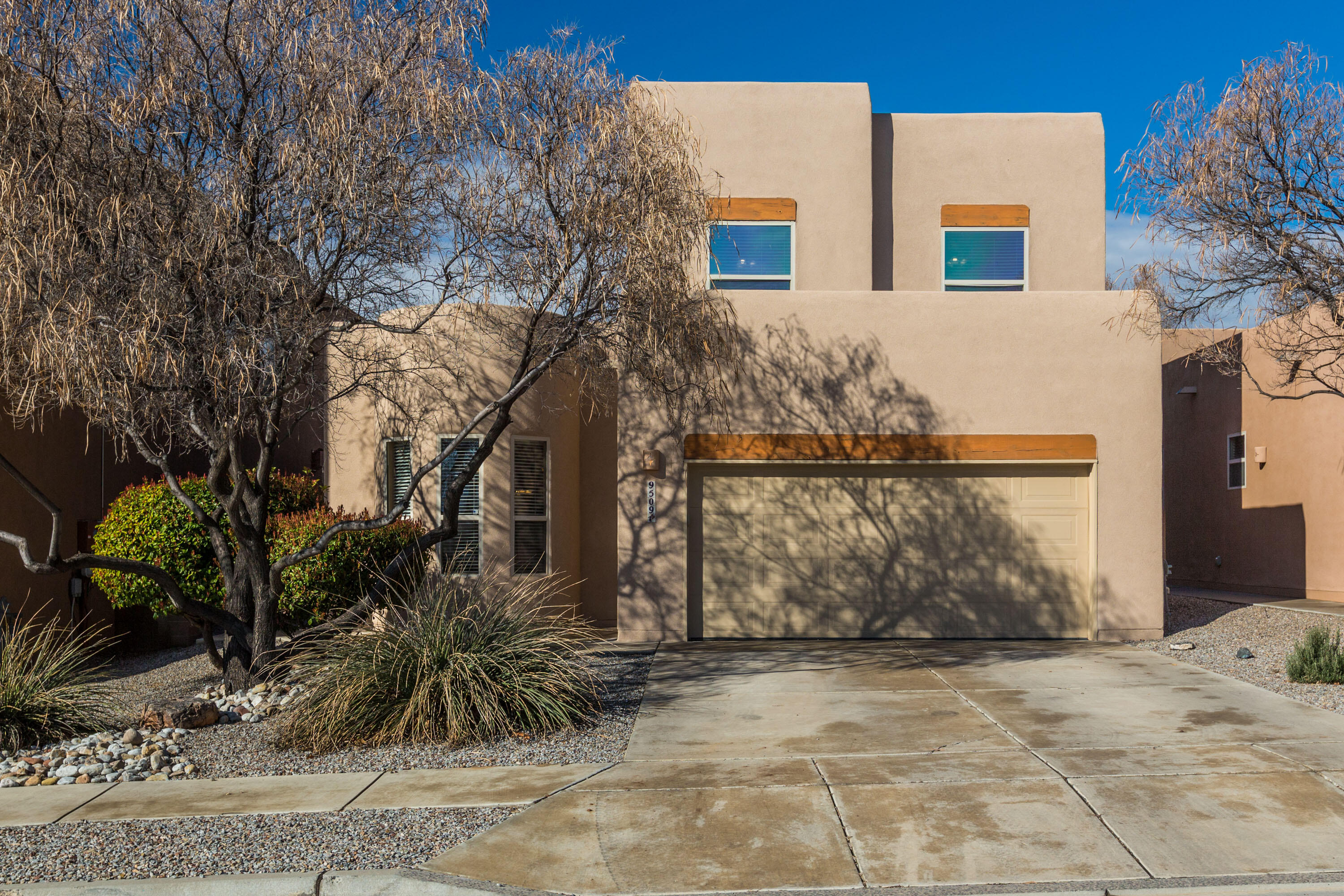 Make this immaculately maintained and upgraded Stillbrooke Homes 4 bed/3 bath in Ventana Ranch/Paradise West your next home. All carpet has been replaced in 2024, double coat synthetic re-stucco in 2022, newer West-facing windows with solar-shield screens, and new paint throughout.  The living room features bay windows and a gas-log kiva fireplace for those cold winter nights.  A large kitchen includes premium stainless appliances with custom Spectrum Granite countertops and an enormous island with plenty of prep area and storage space.  Off the kitchen are a formal dining room and large combination pantry and mud room. Out back, a custom metal gate leads to the tiered backyard with plenty of space under a covered patio for relaxing or entertaining. Make an appointment to see today!