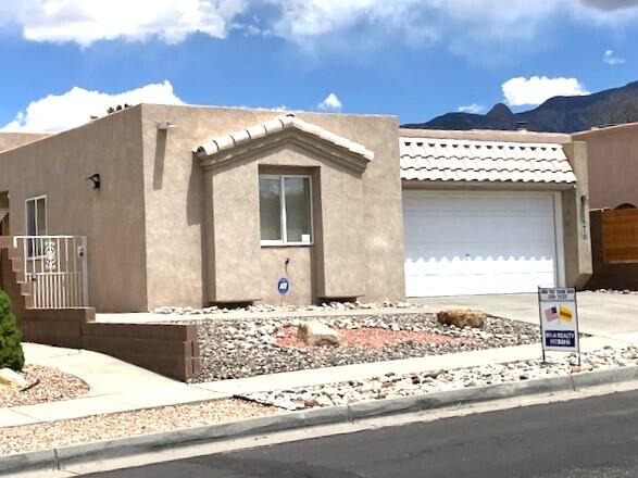 Beautiful home located in Quintessence. Nice and bright floor plan with an abundance of amenities such as: raised ceilings, kiva fireplace, wall niche, built-in shelving, off the master bedroom, extra room could be used as an office, sitting room or 4th bedroom. Wonderful views of Sandias Mountains from your own backyard.