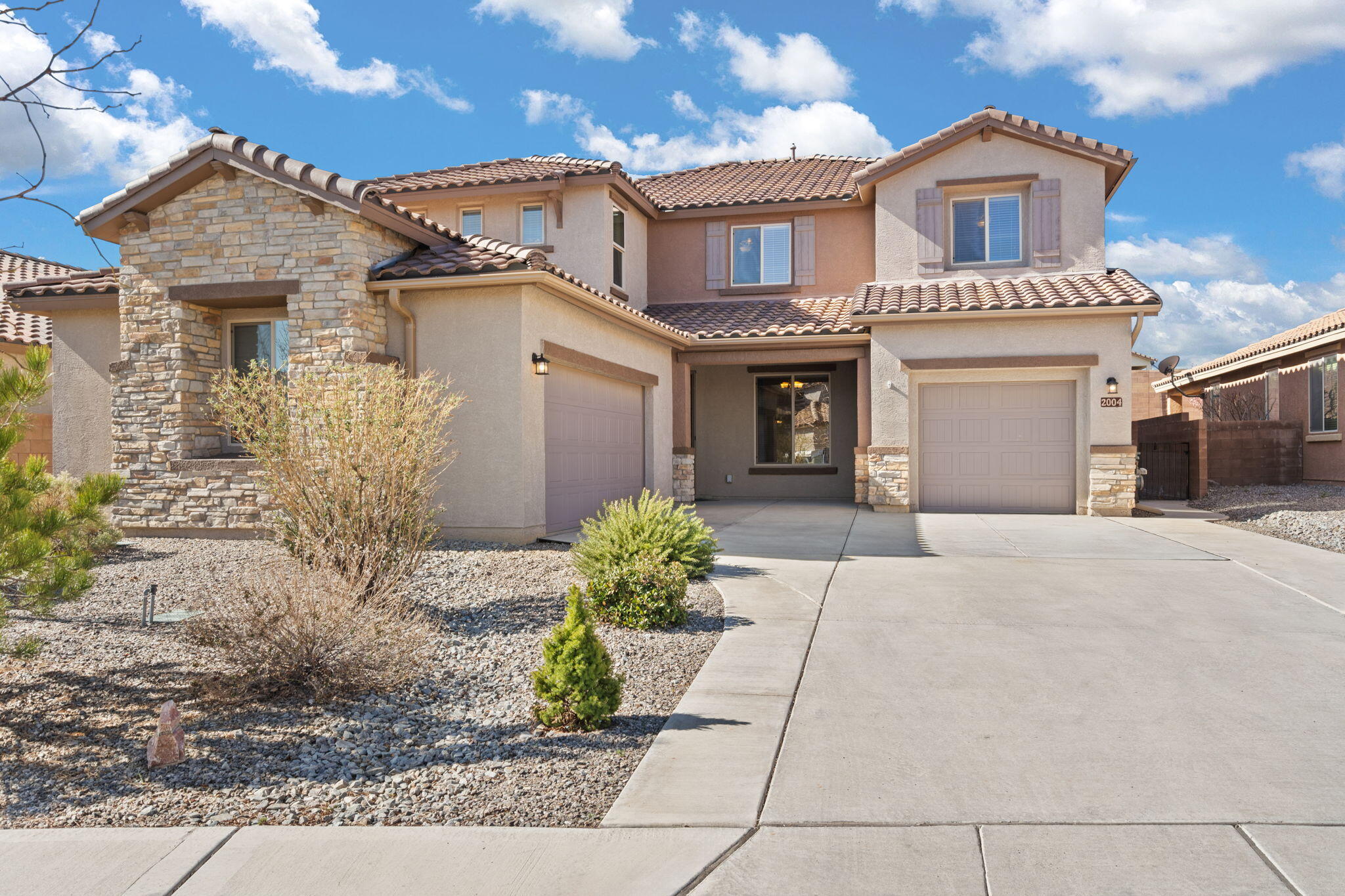 This Pulte Starwood in Mirehaven shines! Featuring 4 bedrooms, 4 baths, an office + a large loft & Pulte Planning Center.  Fantastic floor plan with 20 ft vaulted ceilings, spindle stair railing & fireplace highlighting the living space. Open concept kitchen w/ stainless steel appliances, upgraded cabinetry & butler's pantry. Beautiful porcelain tile flows through the first floor. Downstairs bedroom with ensuite walk in shower for guests, teens or in-laws.  Primary bedroom features a large balcony & large walk-in tile shower. Beautifully landscaped backyard with covered patio, tranquil water feature, rain barrels & bubble drip system to all the greenery. Gutter system, security system, 3 car garage, refrigerated air & tankless water heater. Neighborhood park just around the corner!