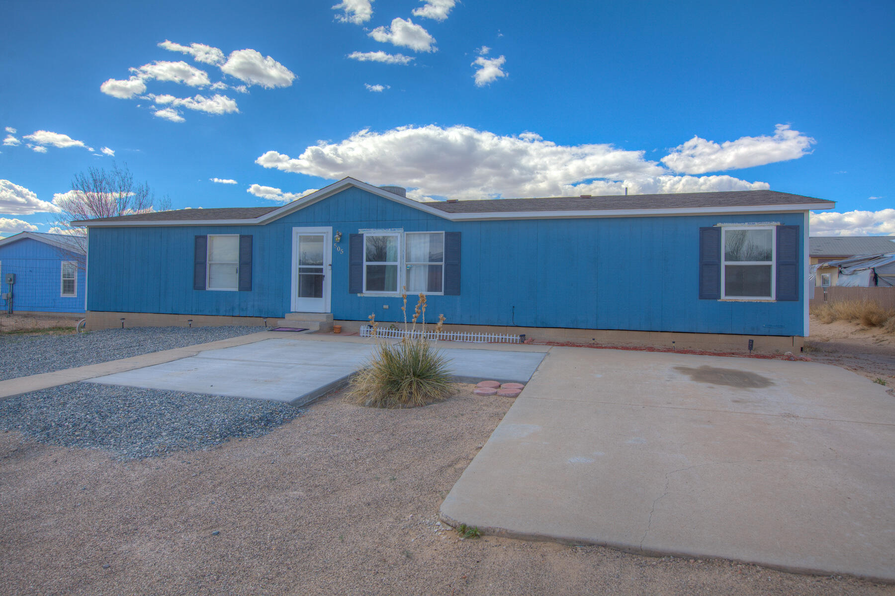 Super clean and hard to find 4 bedroom home on permanent foundation in Rio Rancho. This home also sits on a half acre with plenty of room for parking and additional vehicles. Updates include newer paint, flooring, and electrical upgrades, and a new roof in 2018. Minutes from schools, shopping, dining, and entertainment.