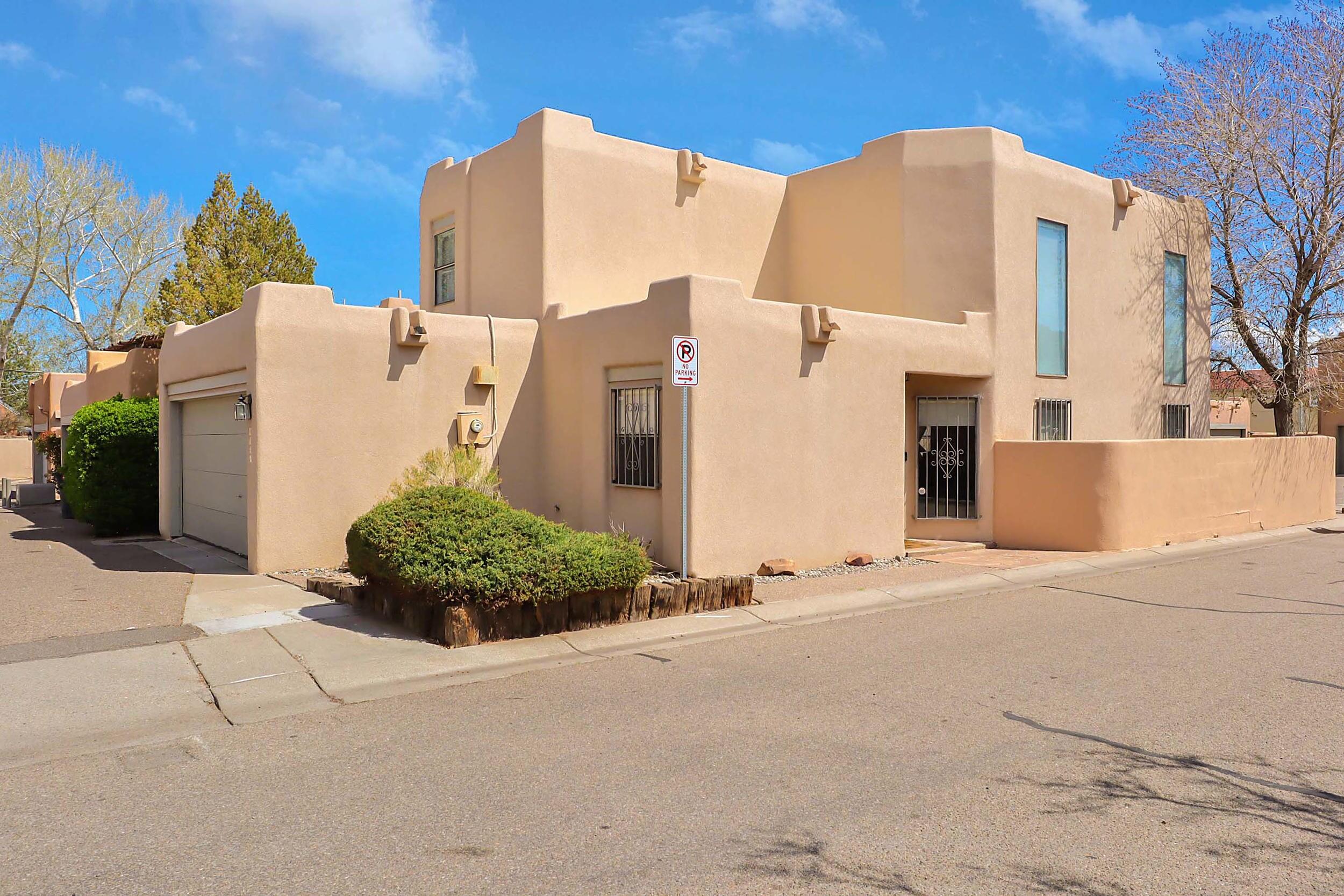 Pueblo Style townhouse in the heart of downtown. Quick access to I-40 and all the convenience of the west side and east side of Albuquerque. Urban living at its best. Saw Mill Market Place, Old Town, Museums, biking and walking trails all within walking distance from the town home community. Primary suite on ground level with a guest bedroom upstairs. Plus a large loft that can be used as another bedroom, hobby room, media room or a workout space. Lots of options. Enjoy morning coffee from the deck and two private courtyards. Low maintenance yard areas. Come see this lovely property today.