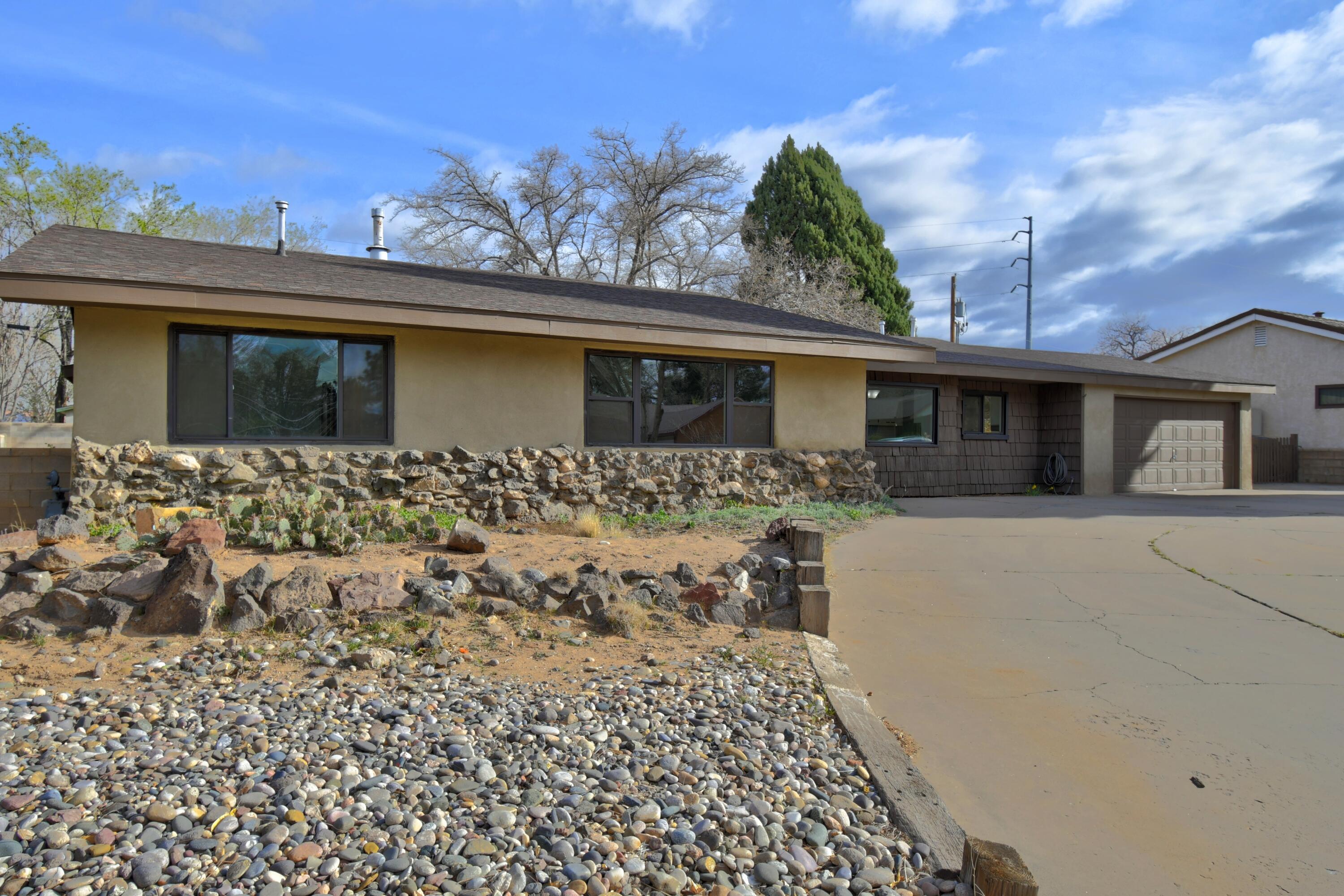 Situated on about 1/3 acre with backyard access, this large and updated floorplan is sure to please. 2 large living areas. 3 very spacious bedrooms, each with their own bath. Oversized garage with workshop area. Great location- minutes to I-25, schools, shopping, and restaurants!