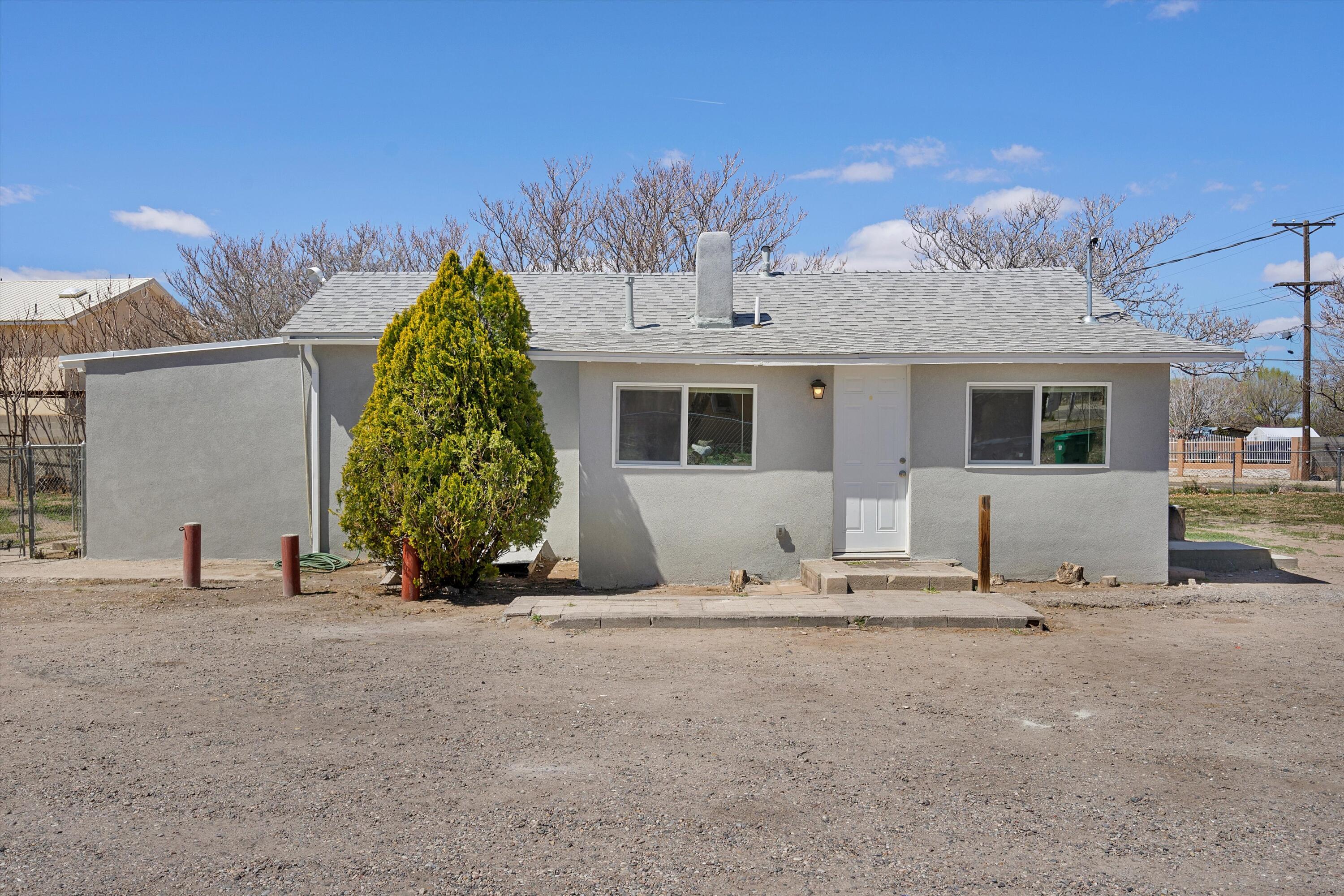 This charming single-family home is now on the market! Featuring 3 bedrooms and 1 bathroom, it's the perfect space for a family or anyone looking for a comfortable space. Meticulously renovated and redesigned, this residence radiates charm and modern elegance. Just minutes away from the heart of Albuquerque, enjoy easy access to downtown attractions, dining, and entertainment.