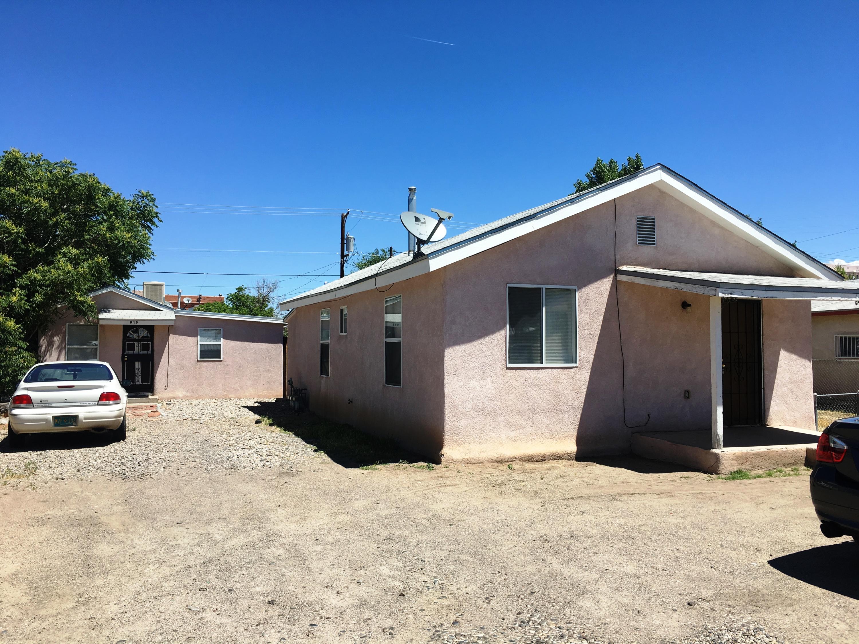 Two stand alone house on 1 lot!  Front Bungalow is 937/SF $1250/m  living room, country kitchen, large laundry room with room for full size appliances and access to private rear yard, two spacious bedrooms one with sitting area & full bath. Rear guest is 622/SF $1050/m  living room, country kitchen, utility room, full bath & two small bedrooms. Each has a separate fenced yard, and shared driveway with their own parking areas. Terrific Barelas location around the corner from the Zoo, Tingley Beach, Parks, railyards, Downtown shops & eateries too!