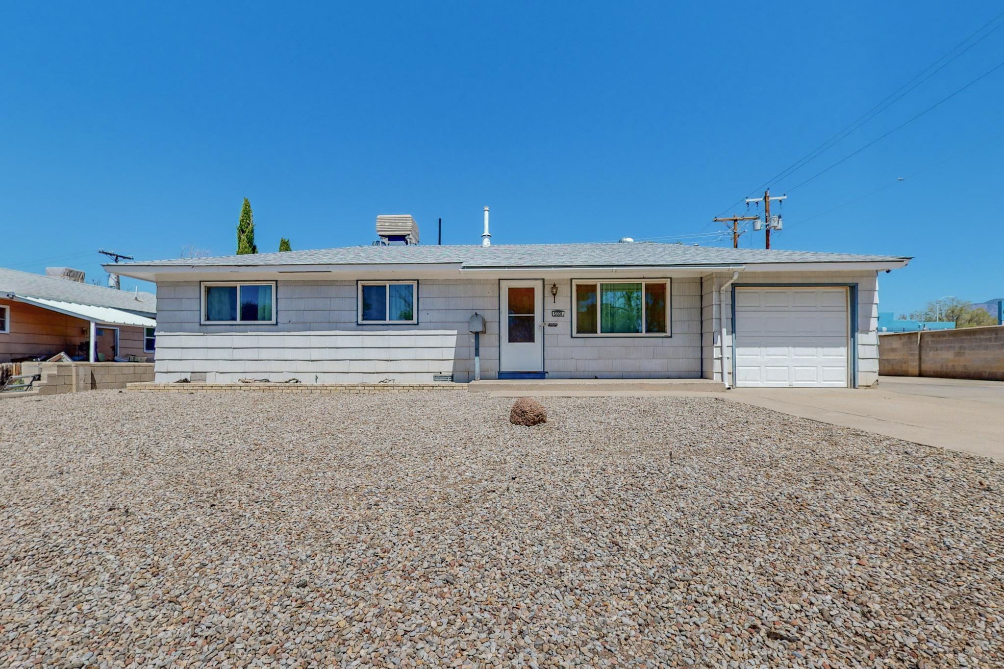 Location is just one great compliment to this 3 bed 2 bath home located in the heart of Albuquerque. Easy access to shopping, schools, restaurants, and I25. This home has so many fantastic features including a large backyard, shed, backyard access, covered patio, great curb appeal, and a large bonus room! Hot water heater being replaced in April. Bonus room fully heated/cooled to make it into anything your heart desires! Are you ready to turn this investment into your future with a little TLC? Contact your favorite realtor to schedule your showing today! Seller to offer Home Warranty coverage with acceptable offer.