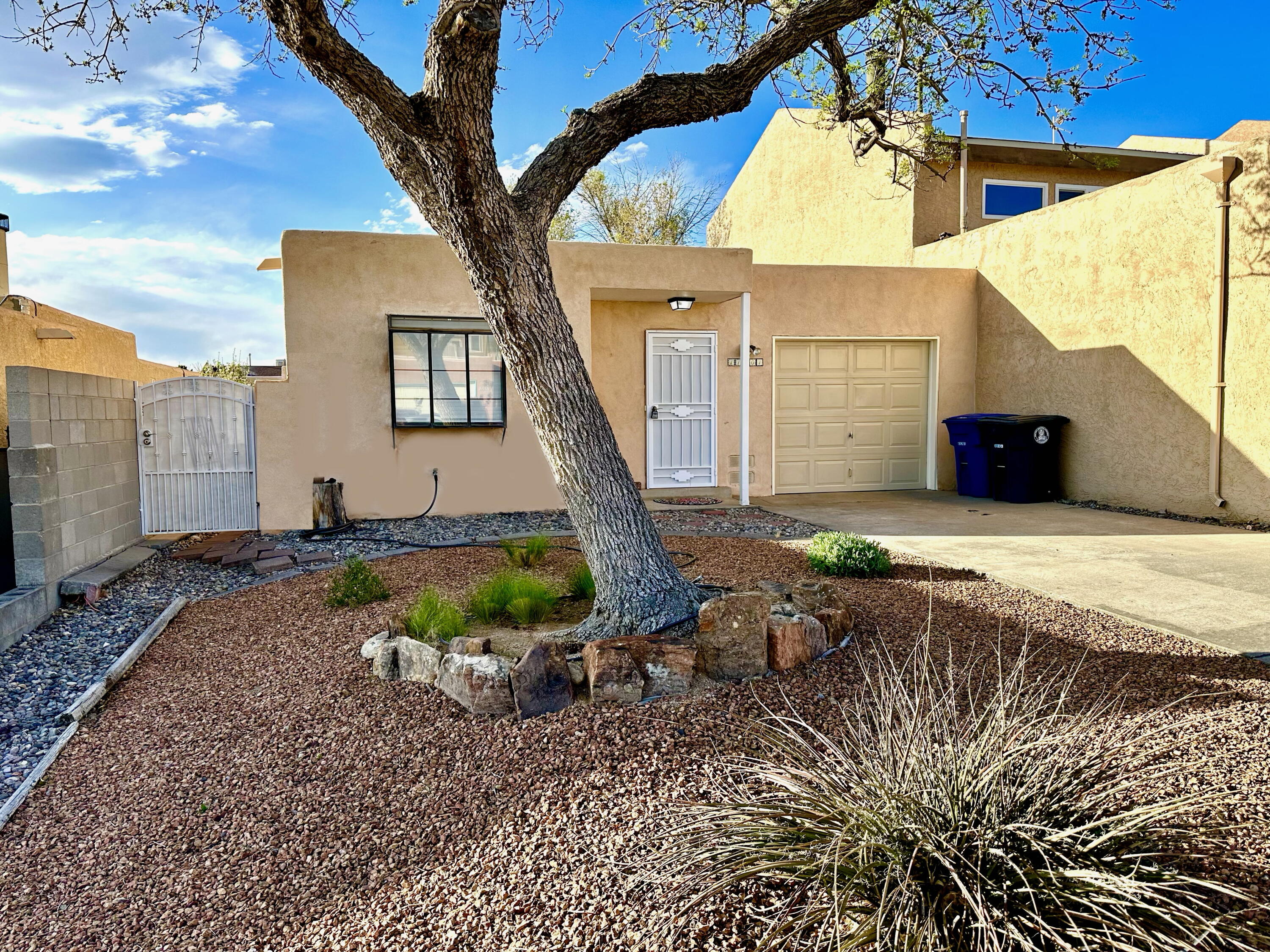 Location, Location, Location!! This Townhouse is right off of Juan Tabo and Spain. This lovely Townhouse is the perfect place to live in comfort without too much worry or stress. It's close to everything in the Heights of ABQ. The floorplan is bright, open & inviting. You have 2 bedrooms and a very nice updated bathroom. The Living Room is spacious and the Kitchen is just right. This Townhouse is perfect for an Investor, a Single person or a Couple just starting out. There's a private & cozy backyard. Don't miss this northeast gem! There is no homeowners association for this townhouse.