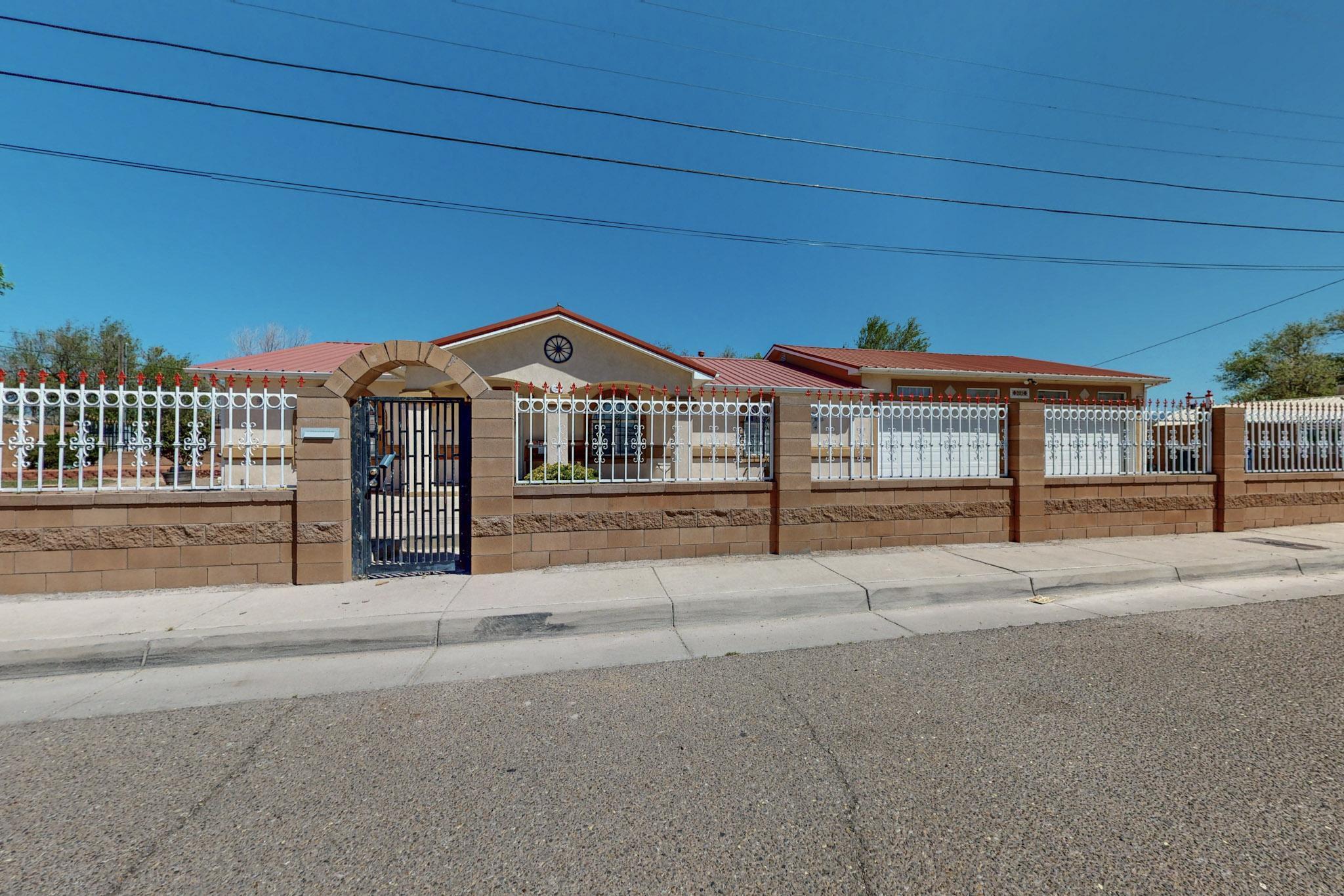 Come view this charming home located just minutes away from downtown Albuquerque. This home has tons of character and also has an oversized finished four car garage that includes a private half bath! Don't miss your opportunity to come check out this hidden gem in SE Albuquerque!